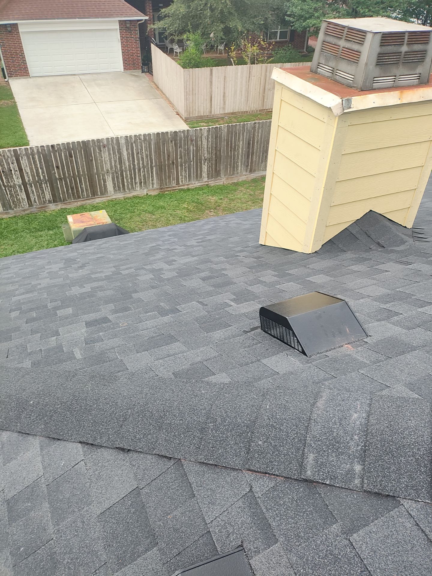 Nothing looks nicer than a little black roof by Bayfront Roofing and Construction