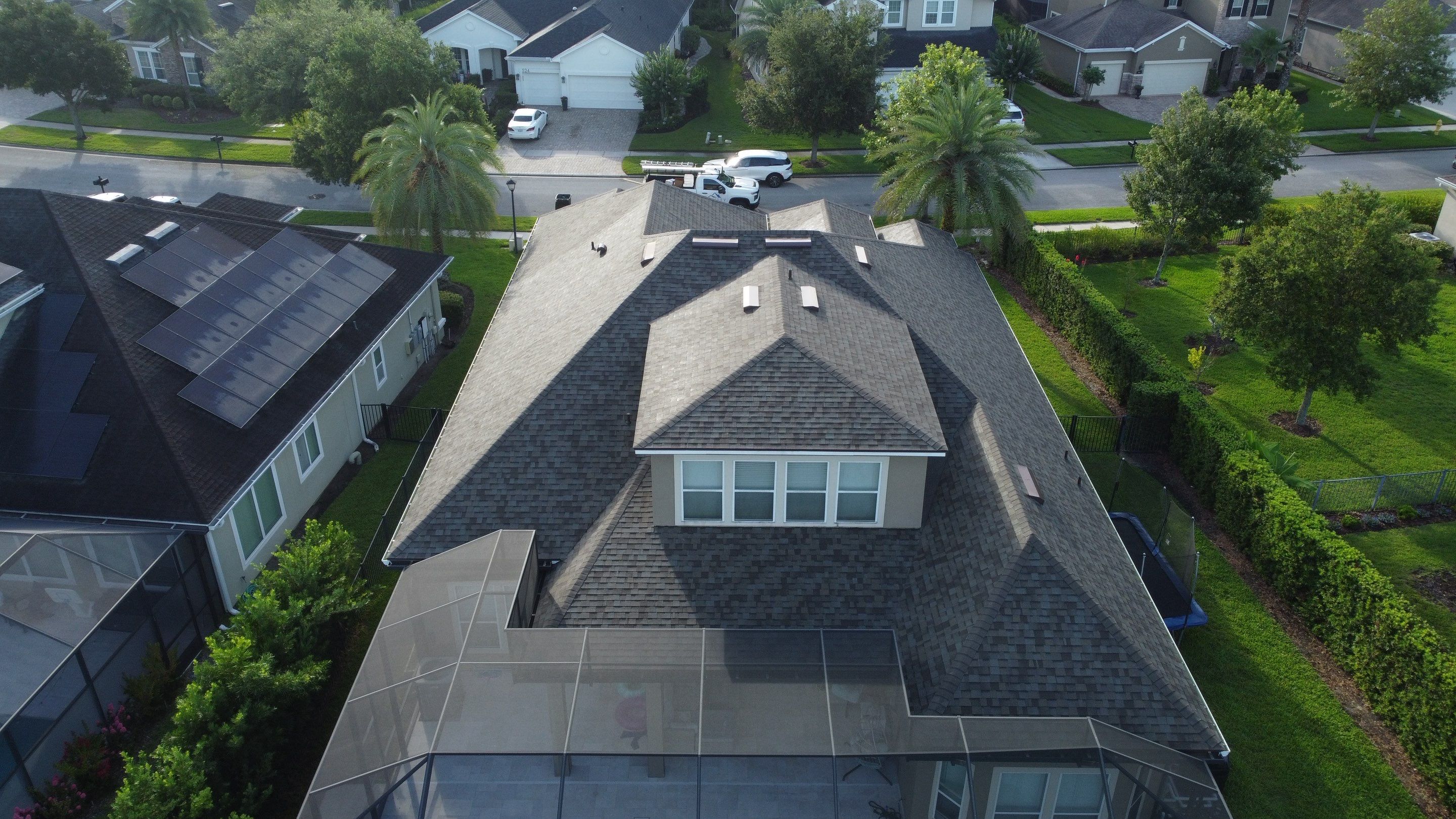 Ponte Vedra Residential Roof Replacement with Driftwood Architectural Asphalt Shingles by Trinity Restoration and Roofing LLC