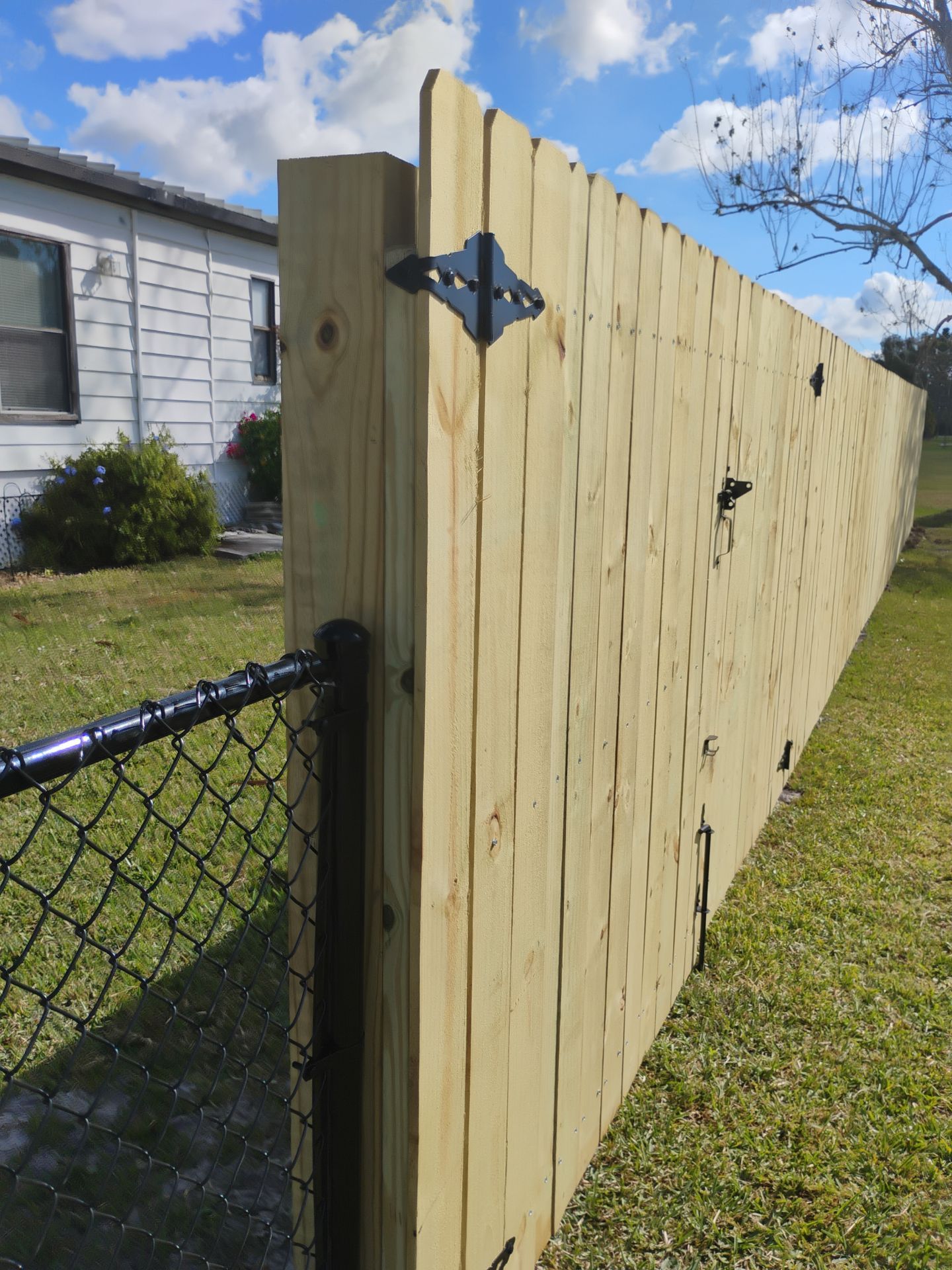 Wood and Chain Link Fence in Port Charlotte by True Fence LLC