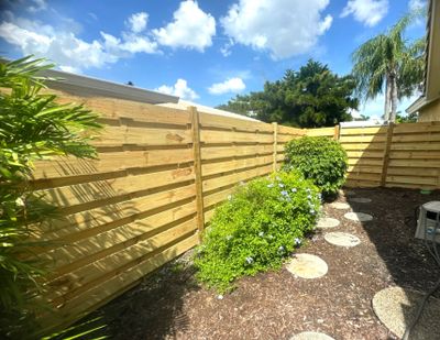Wood Fence Installation using Wood Pressure Treated Fence