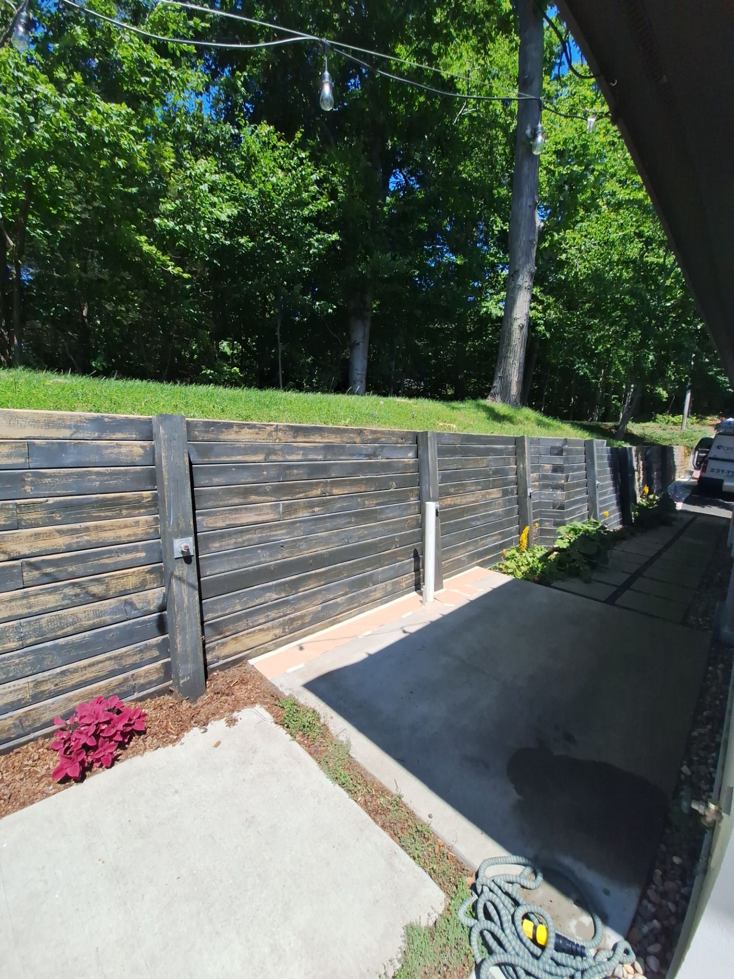 Exterior Retaining Wall Painting | Grand Haven, Michigan by Gordon Painting