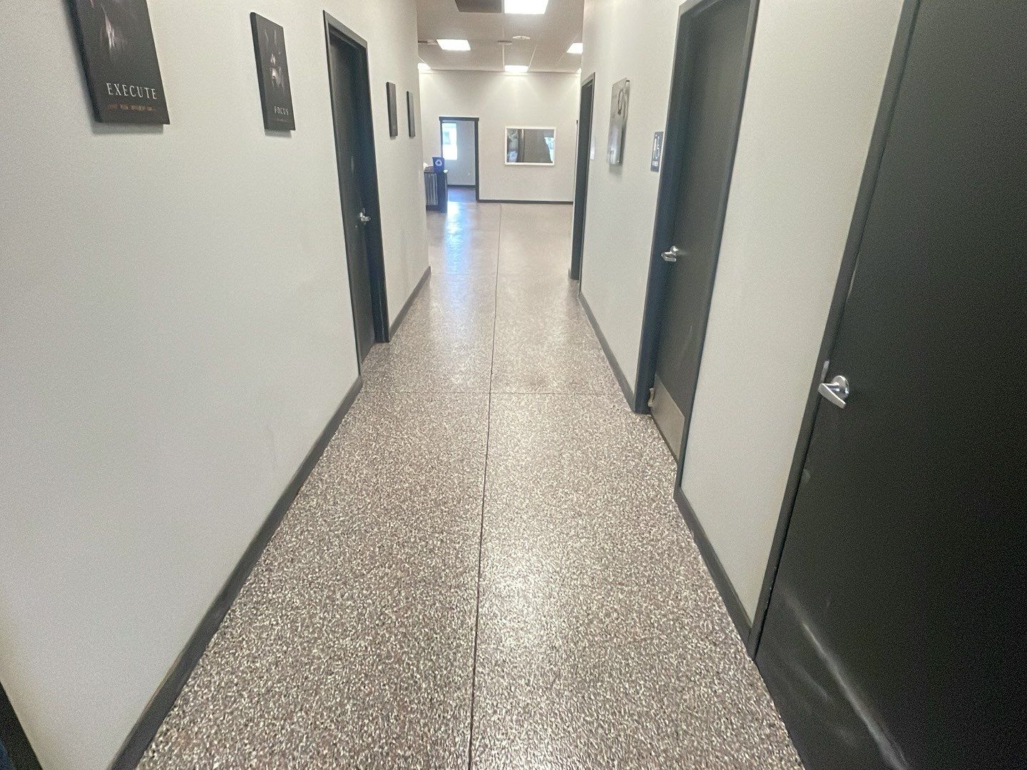 Equipment Share Commercial Floor Transformation using Smoke w/ 5% Orange by Croc Coatings, LLC