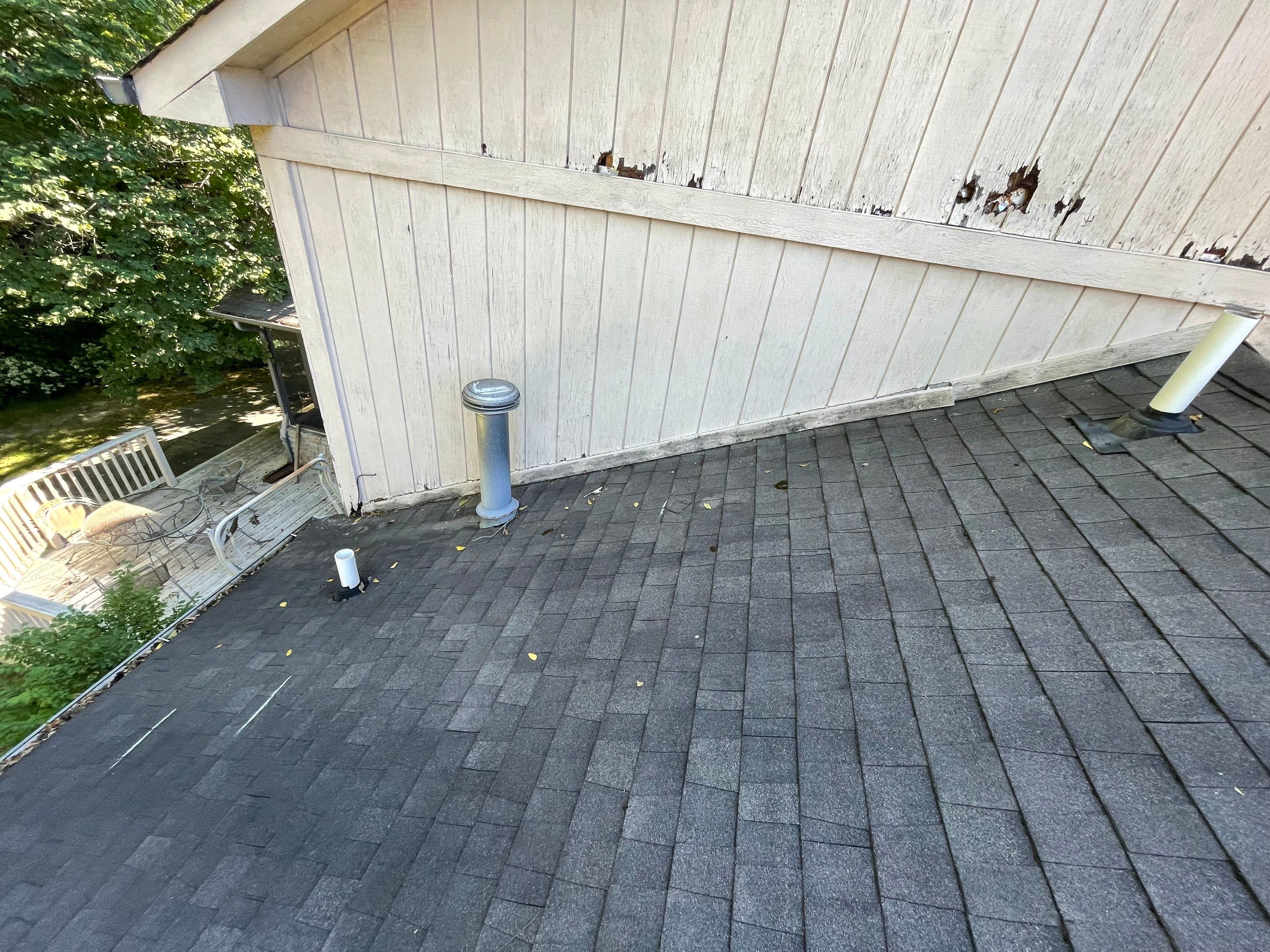 Seabreeze Roof Replacement, Exterior Siding and trim repairs and paint by 317 Roofing & Restorations