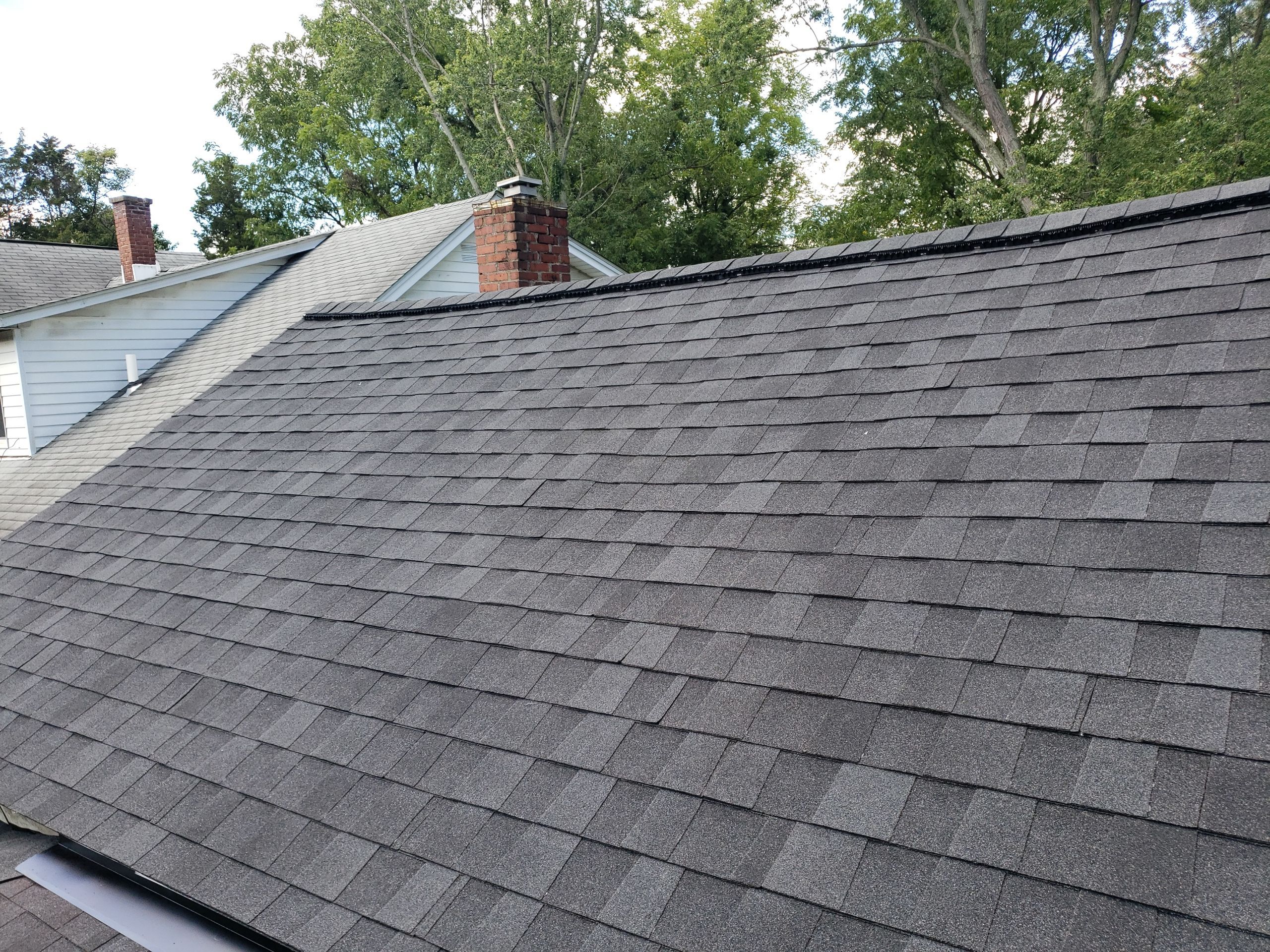 ATLAS PINNACLE COLOR: PRISTINE SCHOTCHGARD BLACK SHADOW DRIP EDGE: BLACK by Eagle Eye Roofing