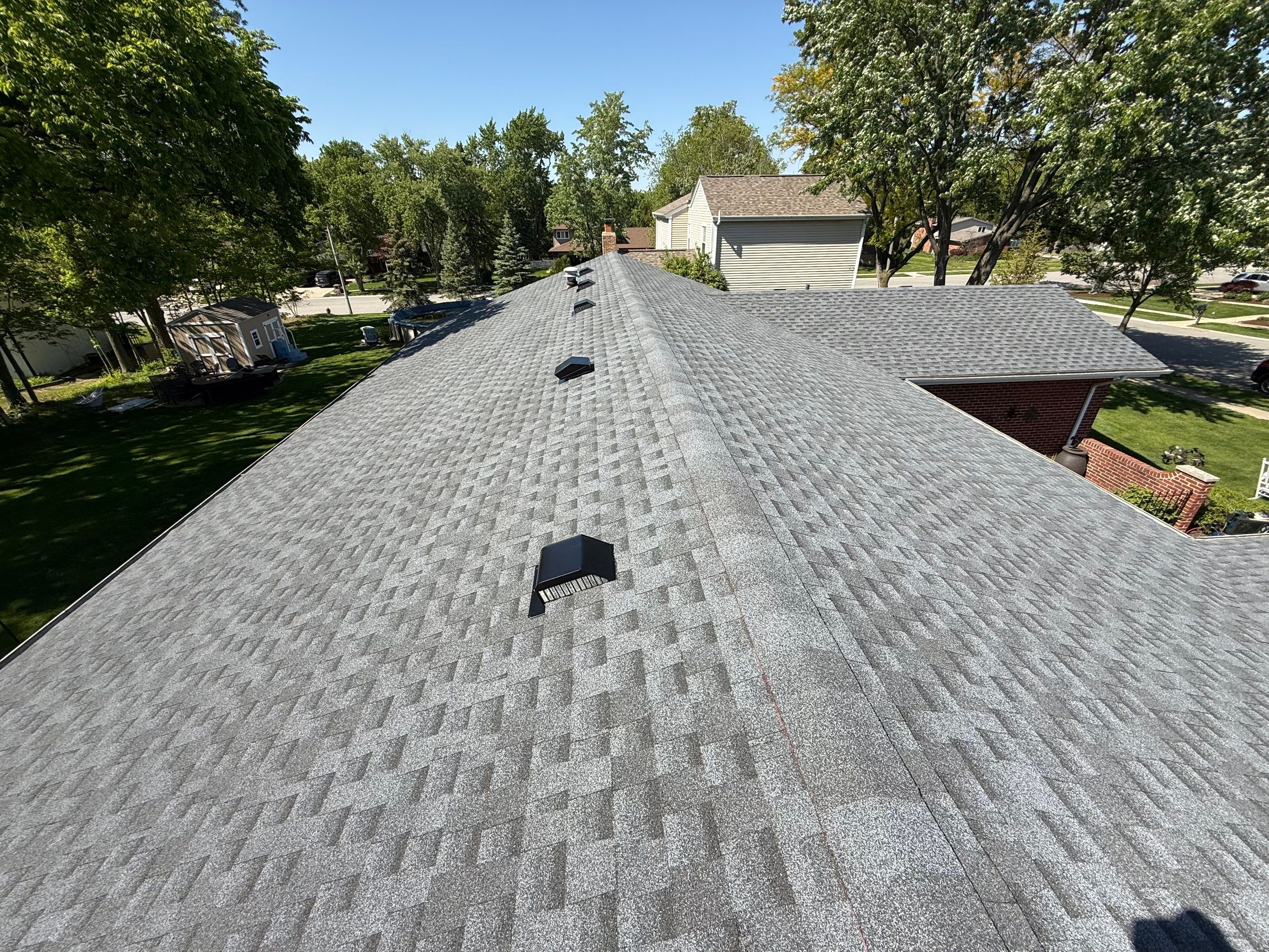 Roof and gutters replacement by Optimal Home Improvement 
