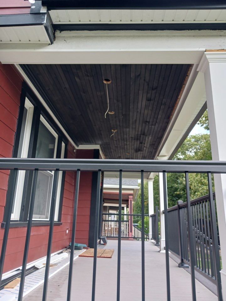 Exterior Renovations- Siding, Stamped Concrete, Porch, and Railings by Ivy Lea Construction