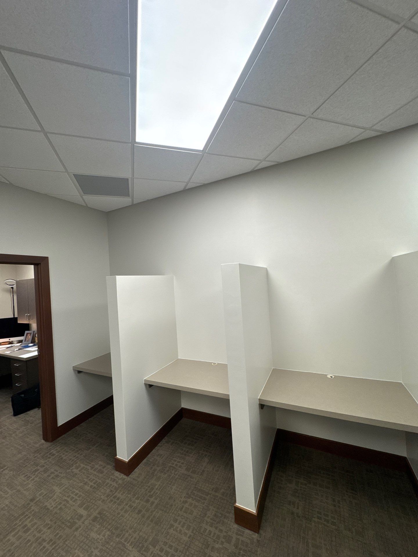 Commercial Office Interior Remodel and Modern Suite Refresh in Sioux Falls by Select Painting, Coatings & Garage Cabinets