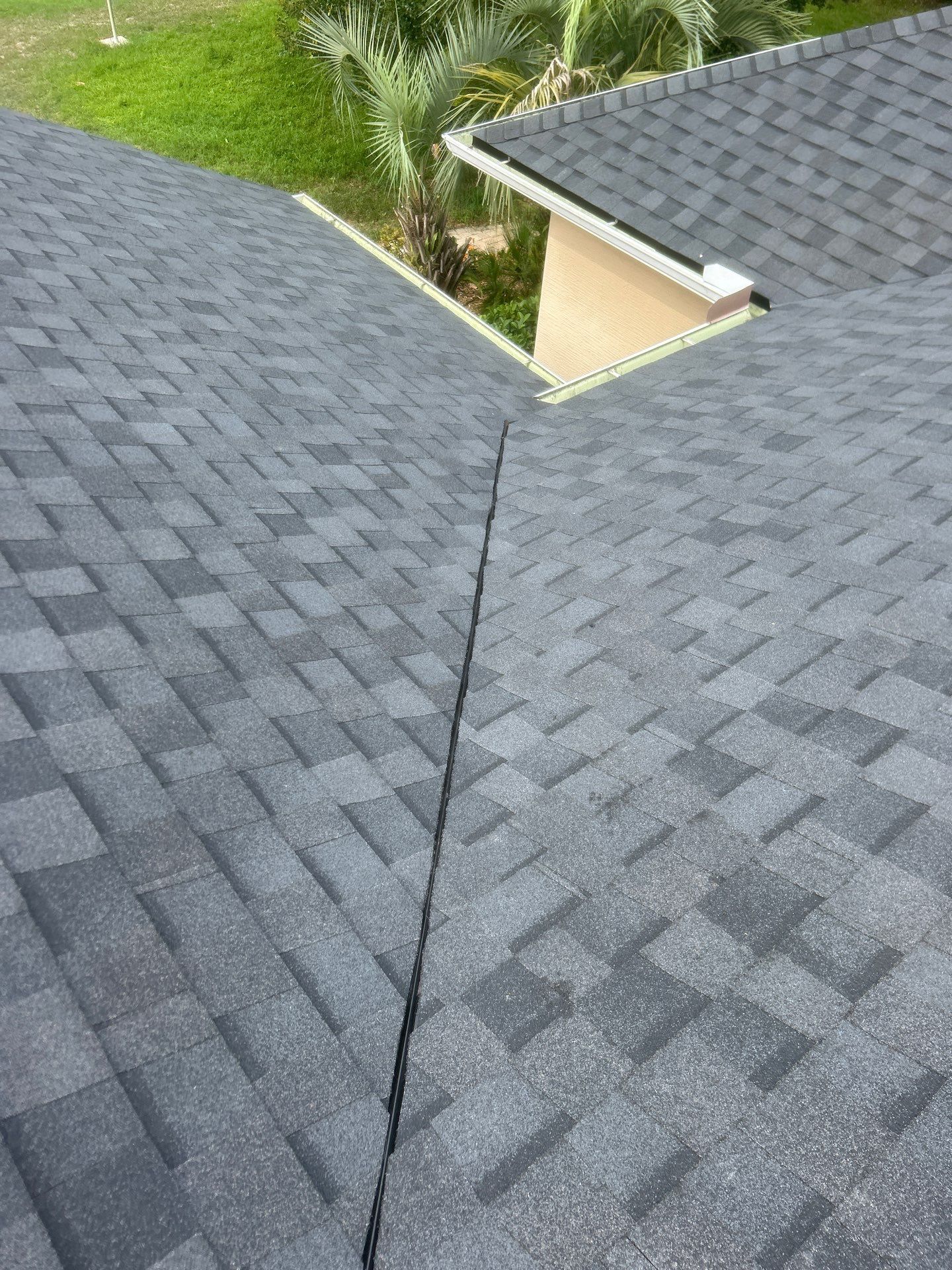 Architectural Shingle Roof Replacement and Skylight Installation in Port Orange by Tip Top Roofing Co., Inc.