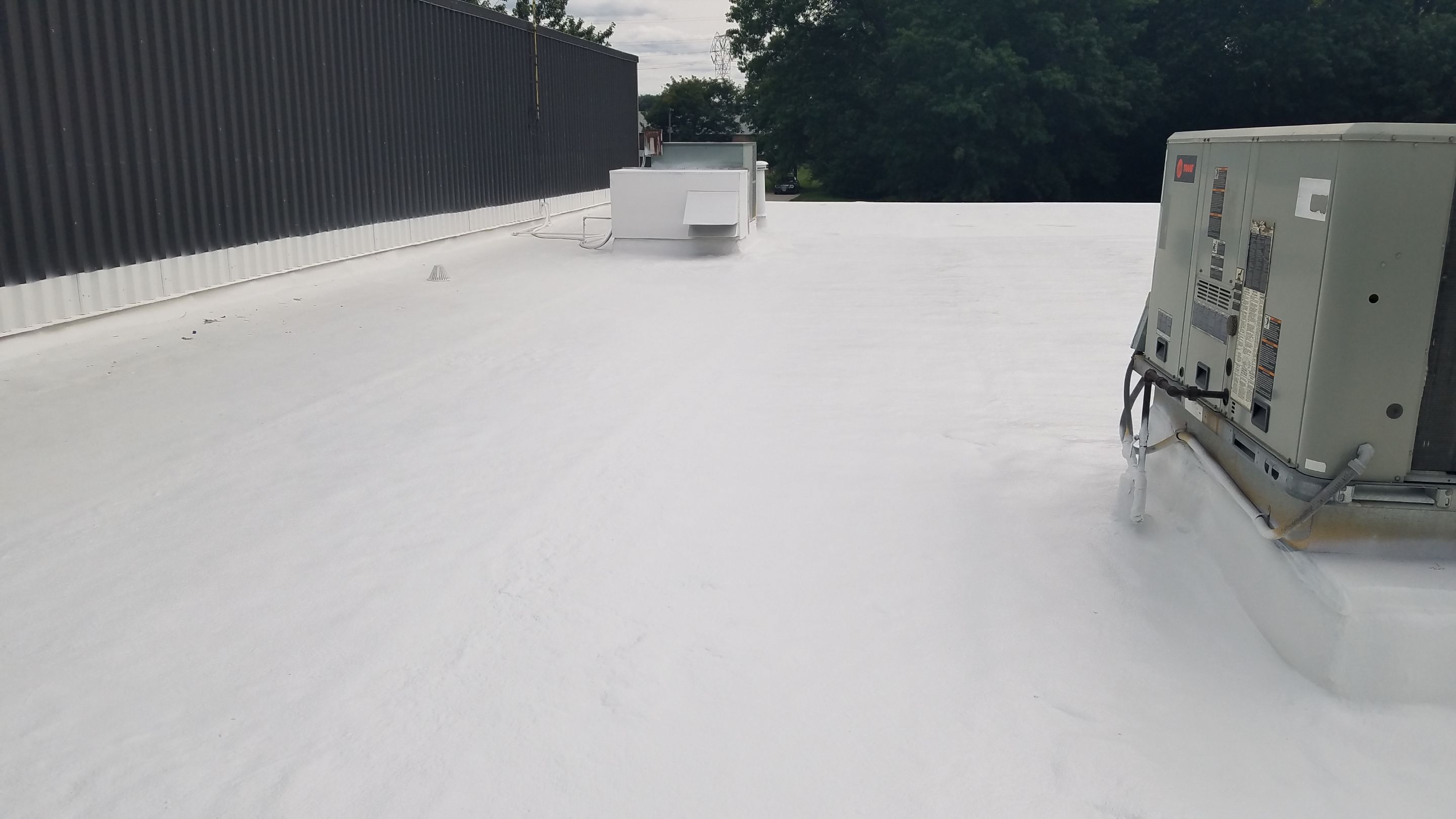 Spray Foam Roof System by Gold Star Roofing LLC 