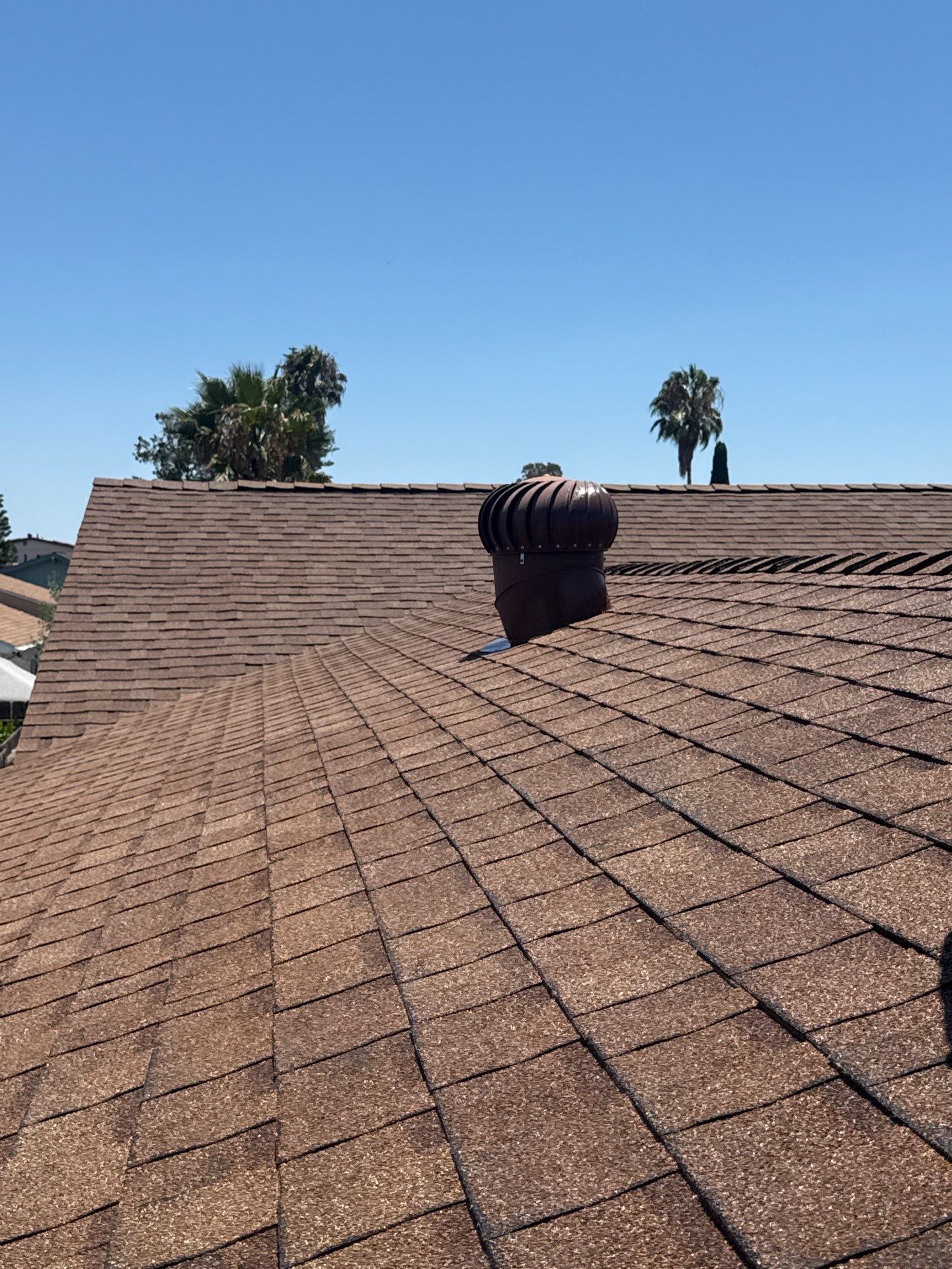 Asphalt Shingle Roof Rejuvenation and Vent Sealing in San Diego by Reliable Roofing San Diego Inc.
