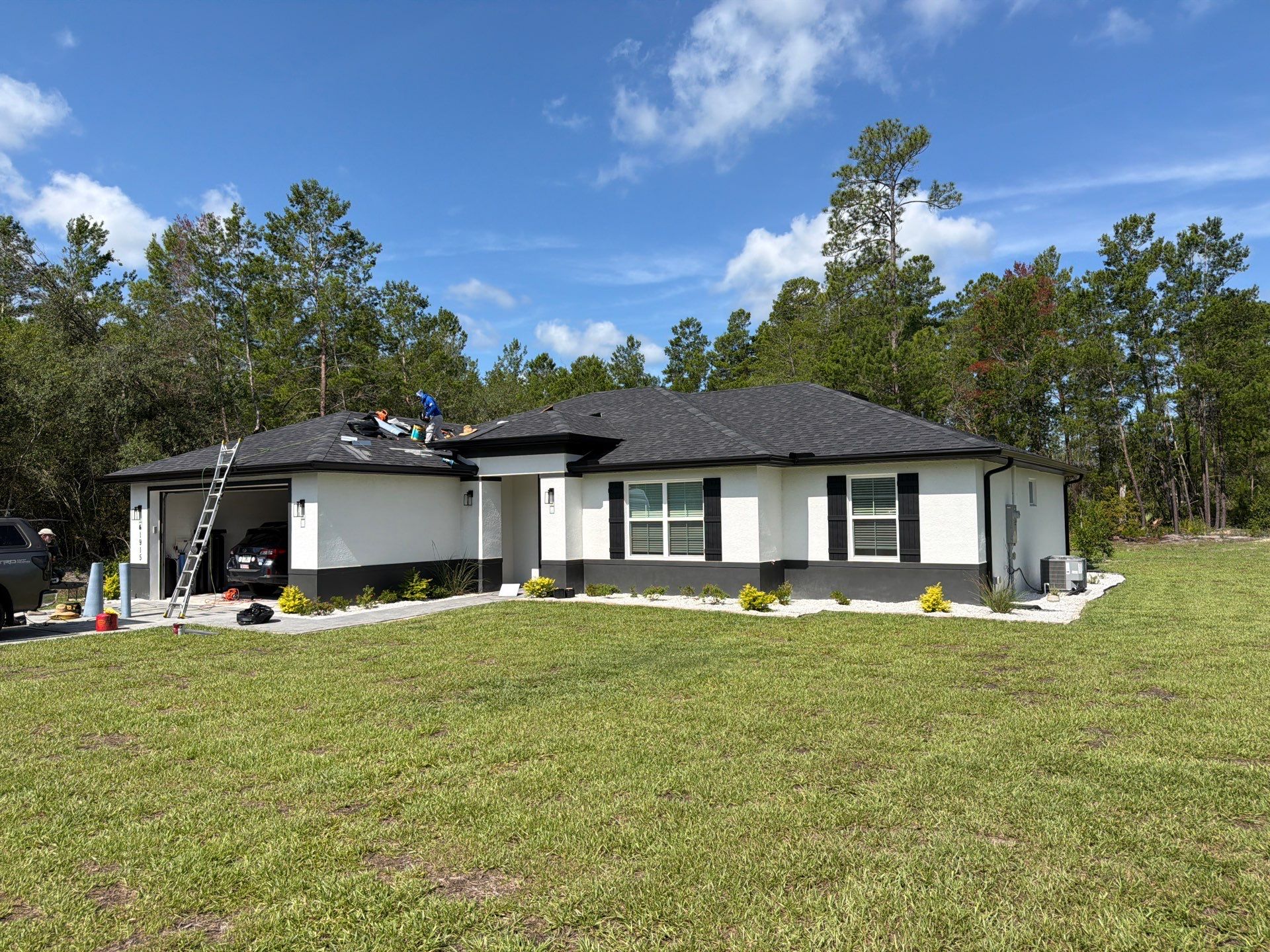 GAF Asphalt Shingle Roof Replacement with Skylight in Eustis by Fortified Roofing Solutions Corp.