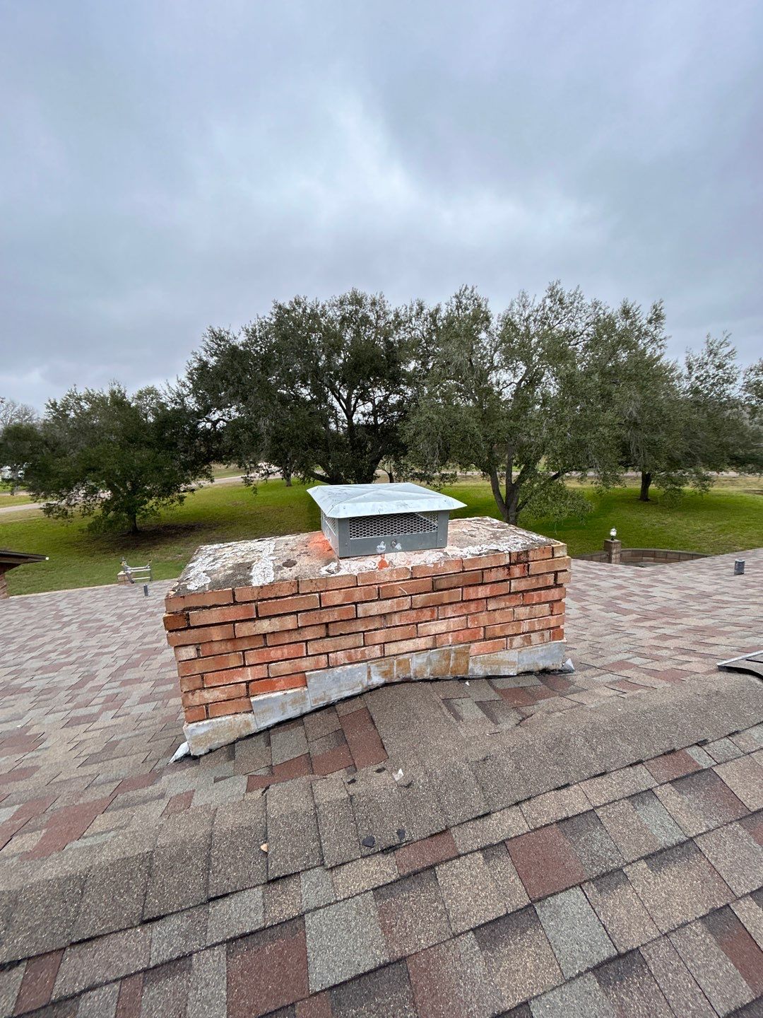 Residential Roofing Repair using Custom Fabricated Metal Spark Arrestor by Lighthouse Roofing