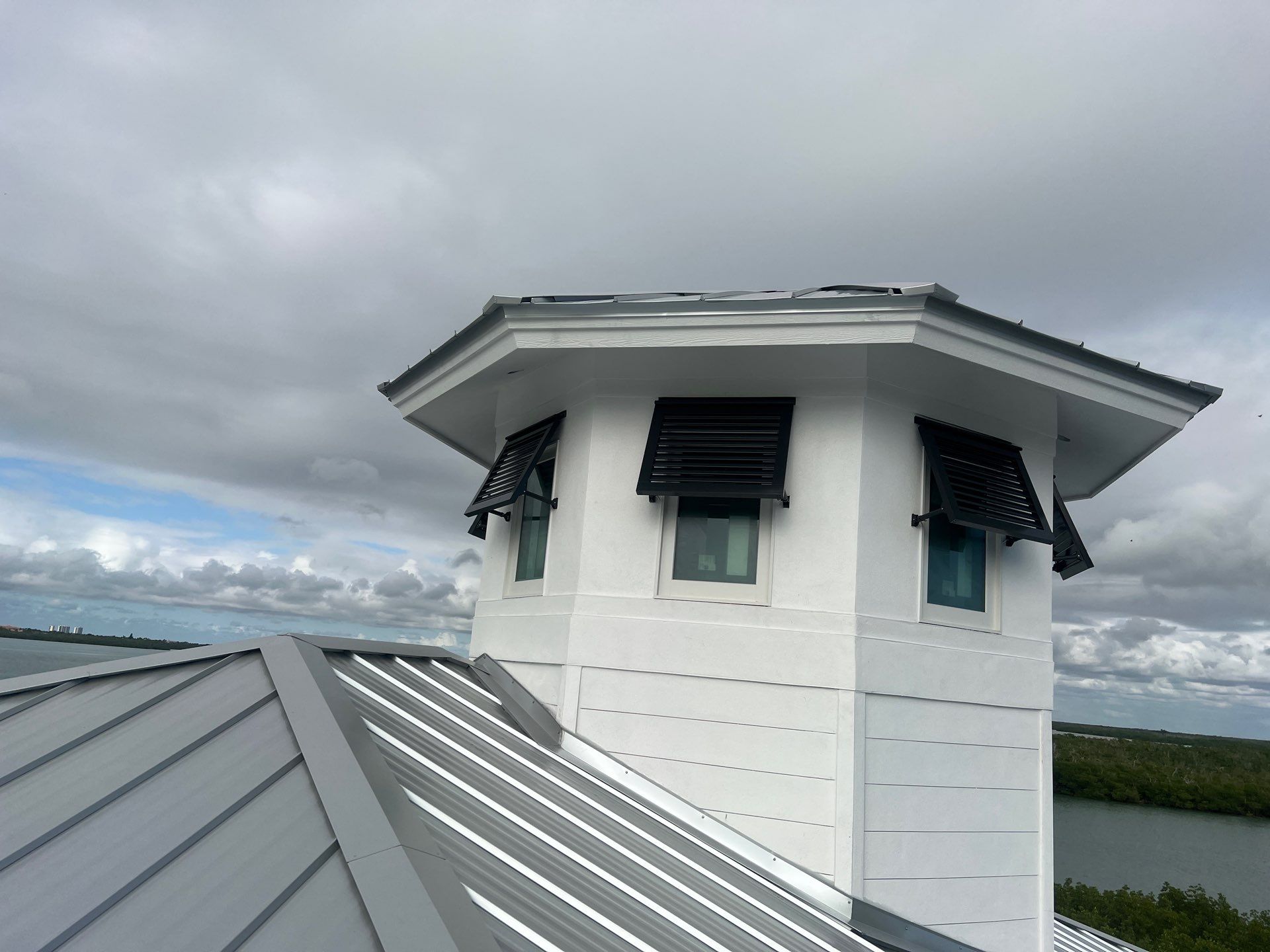 Residential Roofing Installation using Galvalume Standing Seam by Durabilis Roofing INC
