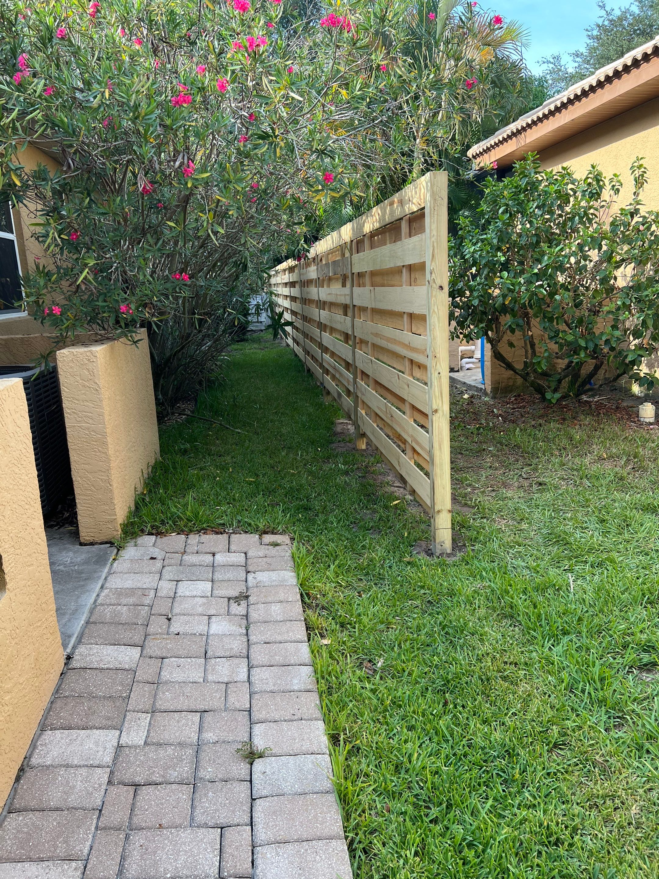 Osprey, FL 6ft. Tall Treated Horizontal Shadowbox Wood Fence by Asap fence and gates, LLC