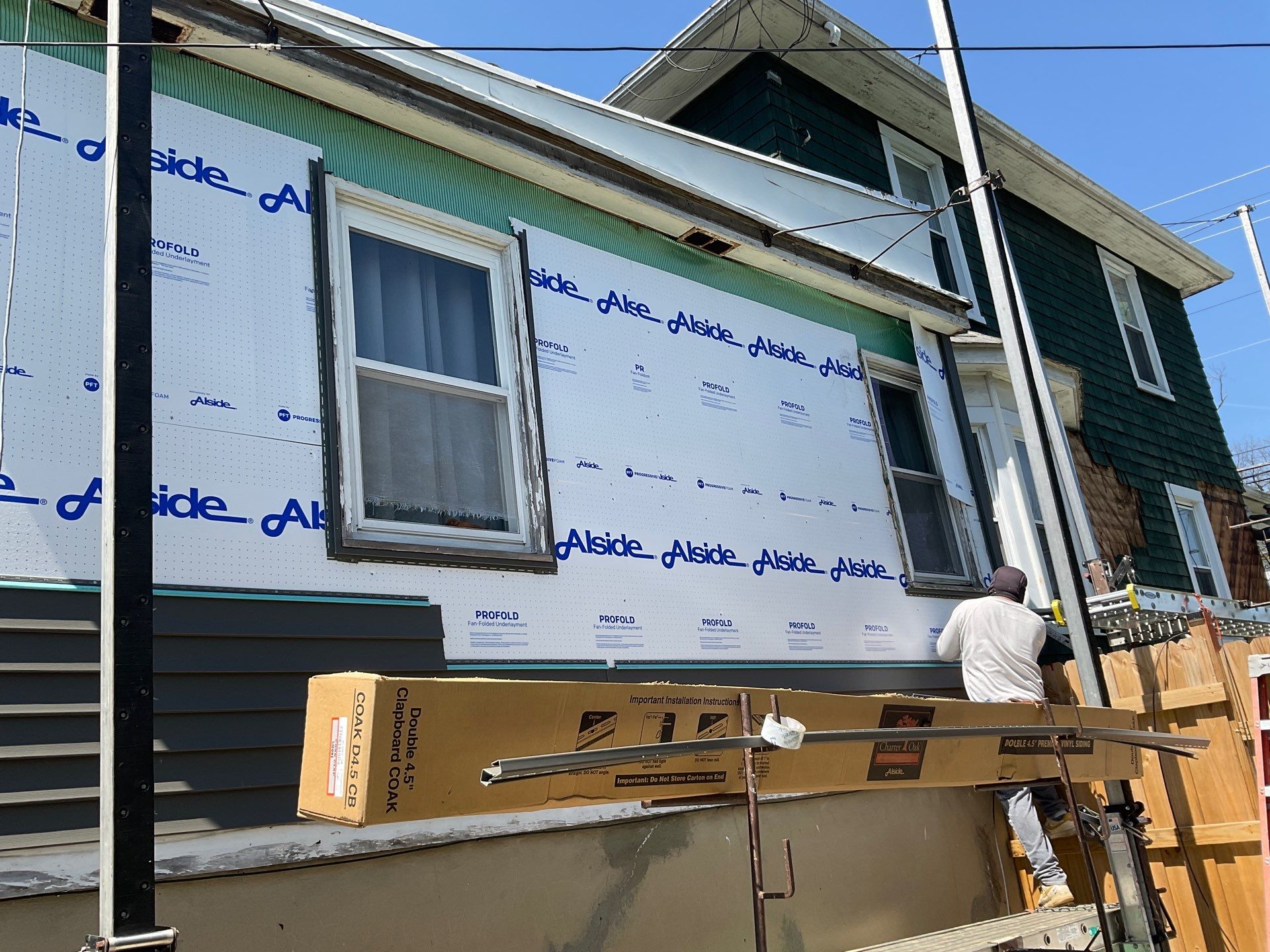 New siding & New Gutters by Alpha Design Services