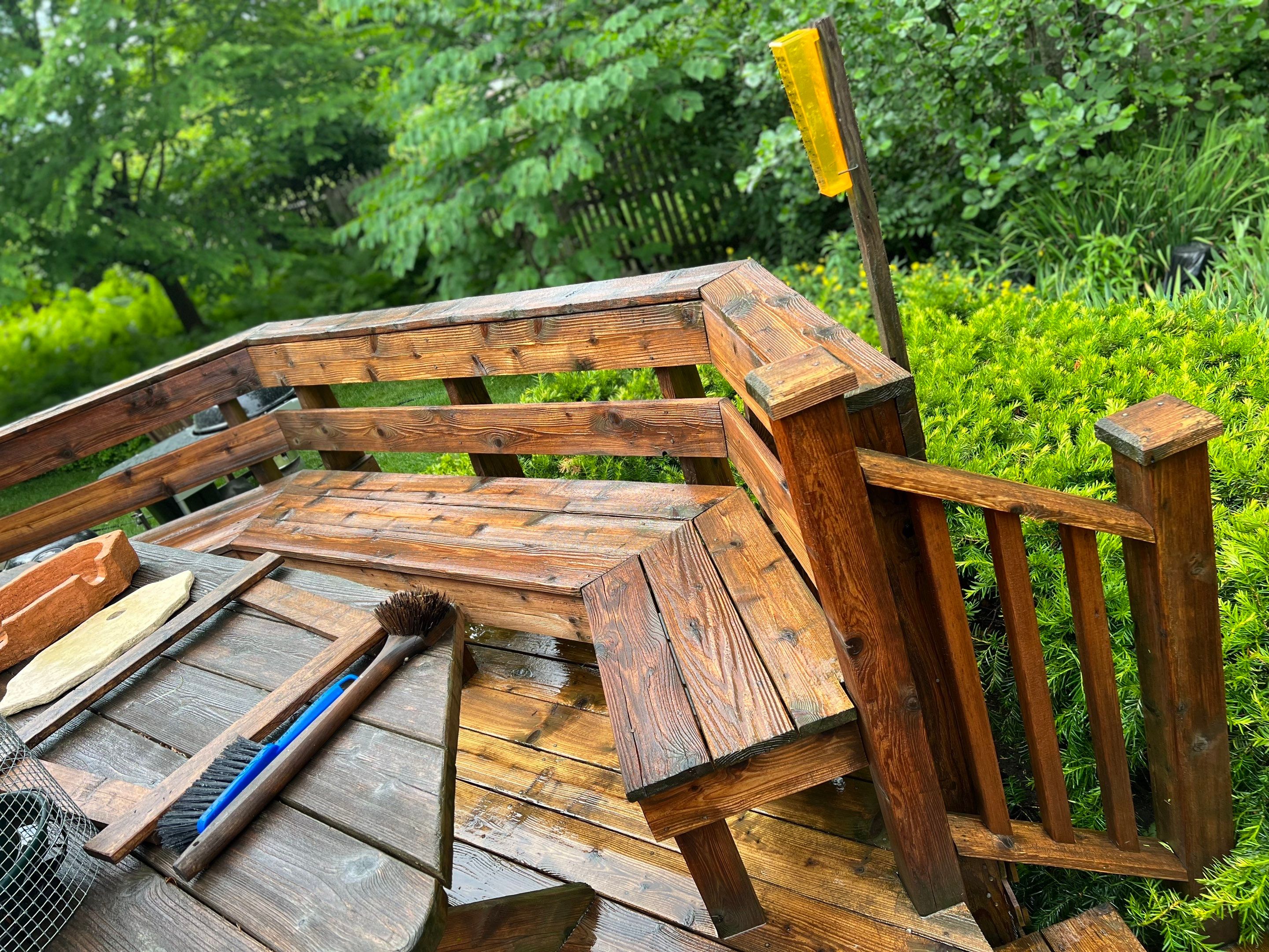 Wood deck cleaning, board replacement and staining by Northern Power Washing LLC.