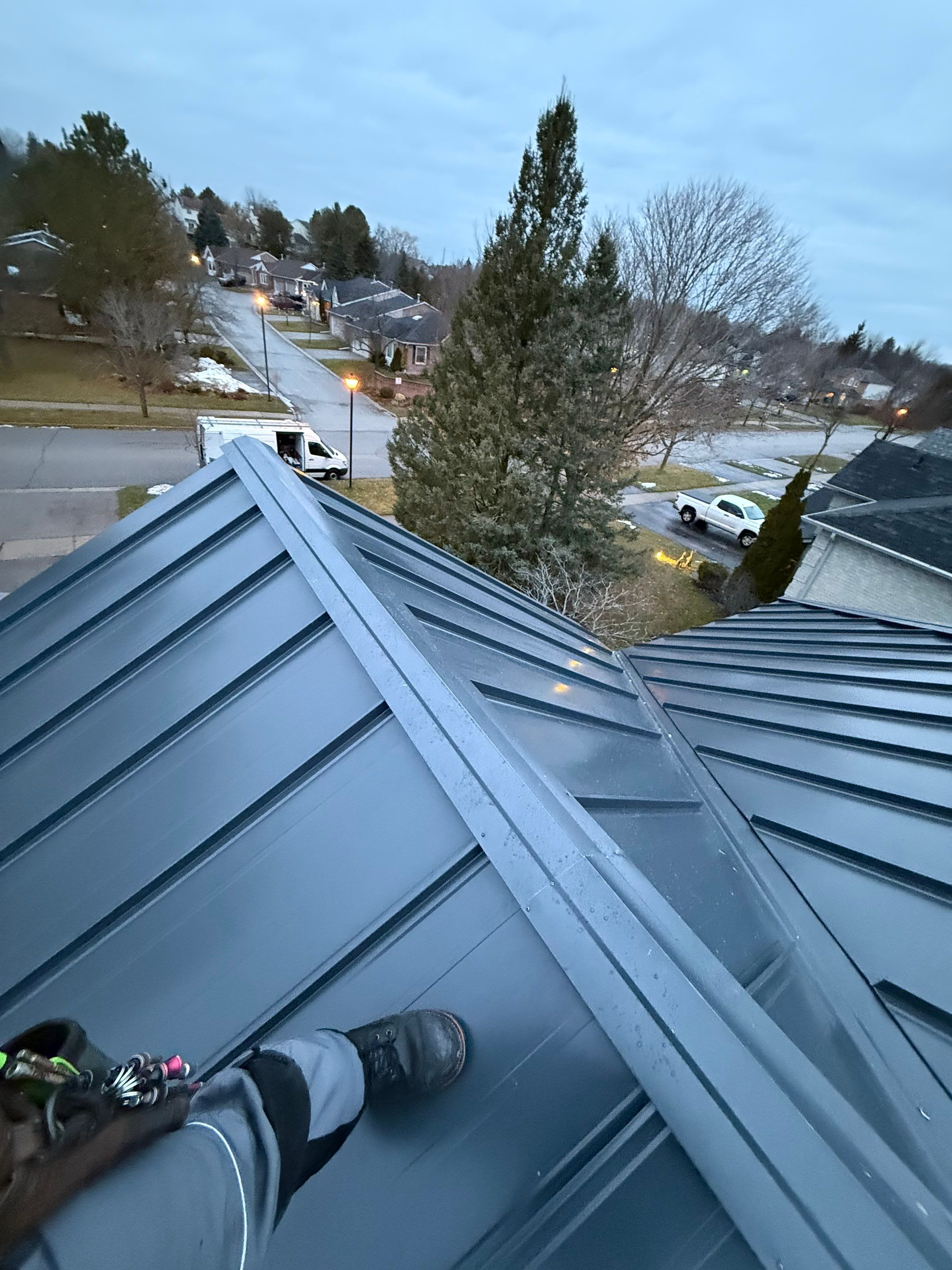 Roof Replacement using 16" Standing Seam Panels by Jay Carter Roofing & Sheet Metal