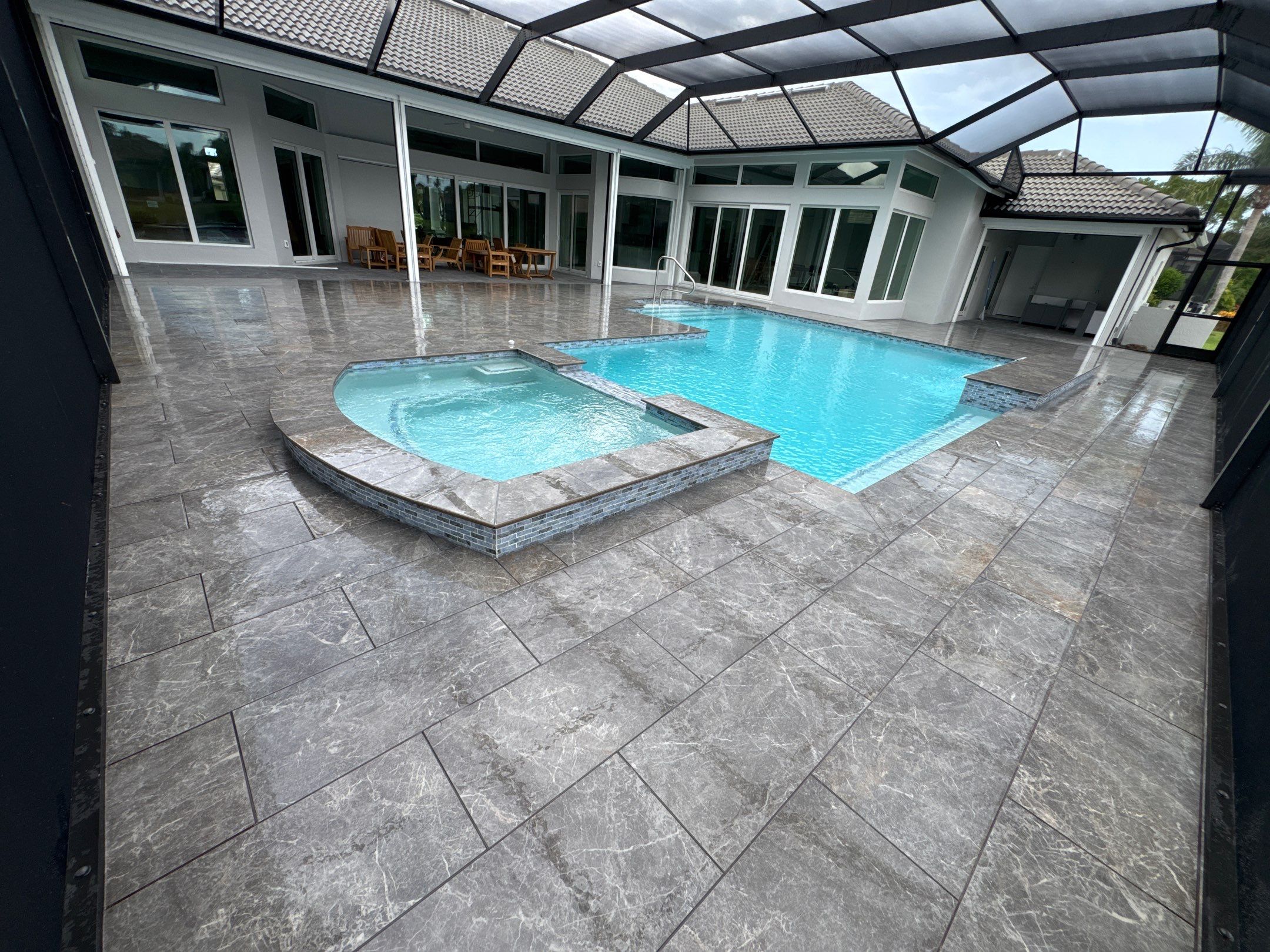 Pool Renovation/Porcelain pavers/Wild Cat Run by Old Town Pavers Llc