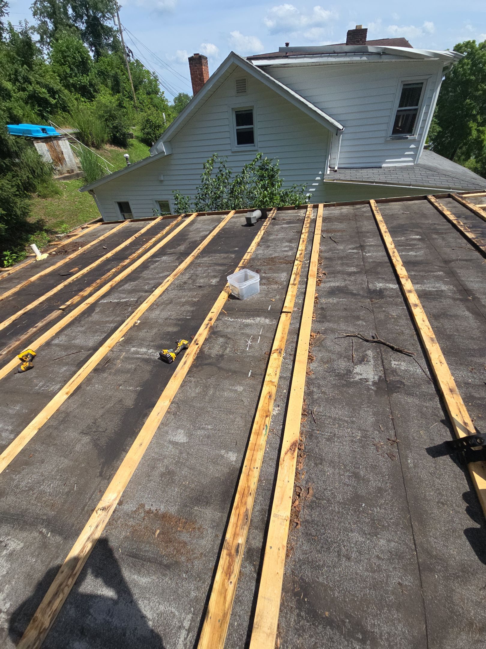 Residential Roofing Installation using Metal by Rainstoppers Roofing