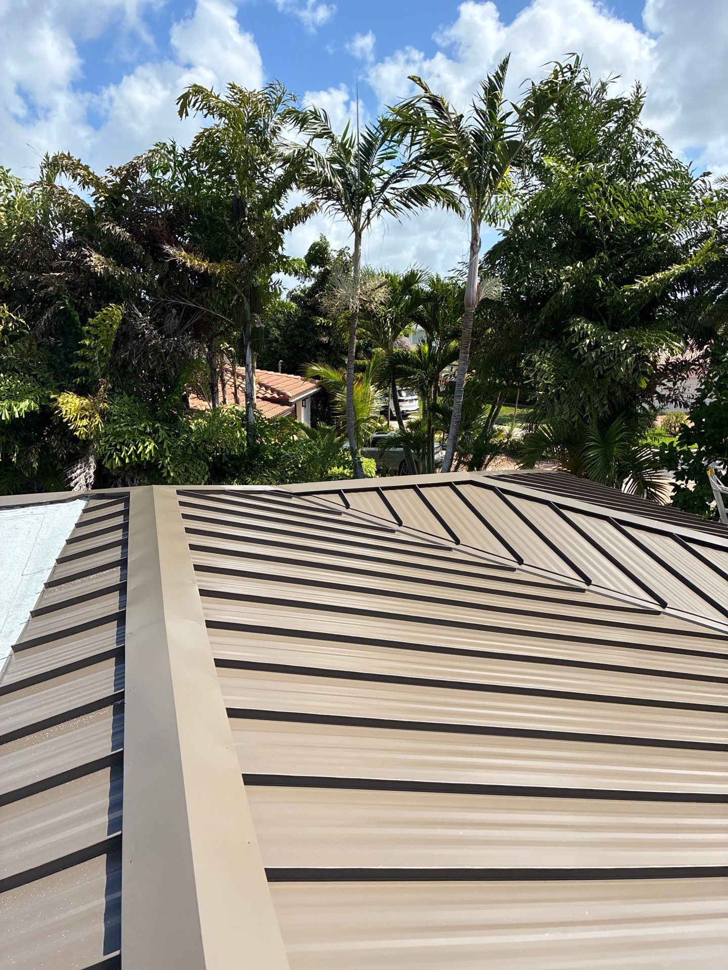 .032 Aluminum 1.5" Mechanical Seam Medium Bronze by Total Roofing System The Metal Roof Experts