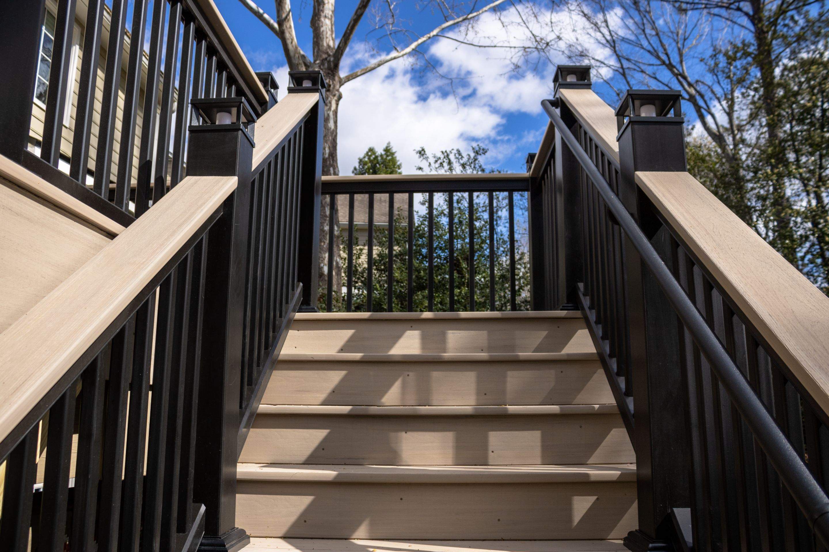 Deck Resurface and Screened-In Porch Build with Timbertech LED Lantern Post Cap Lights by Nelson Exteriors