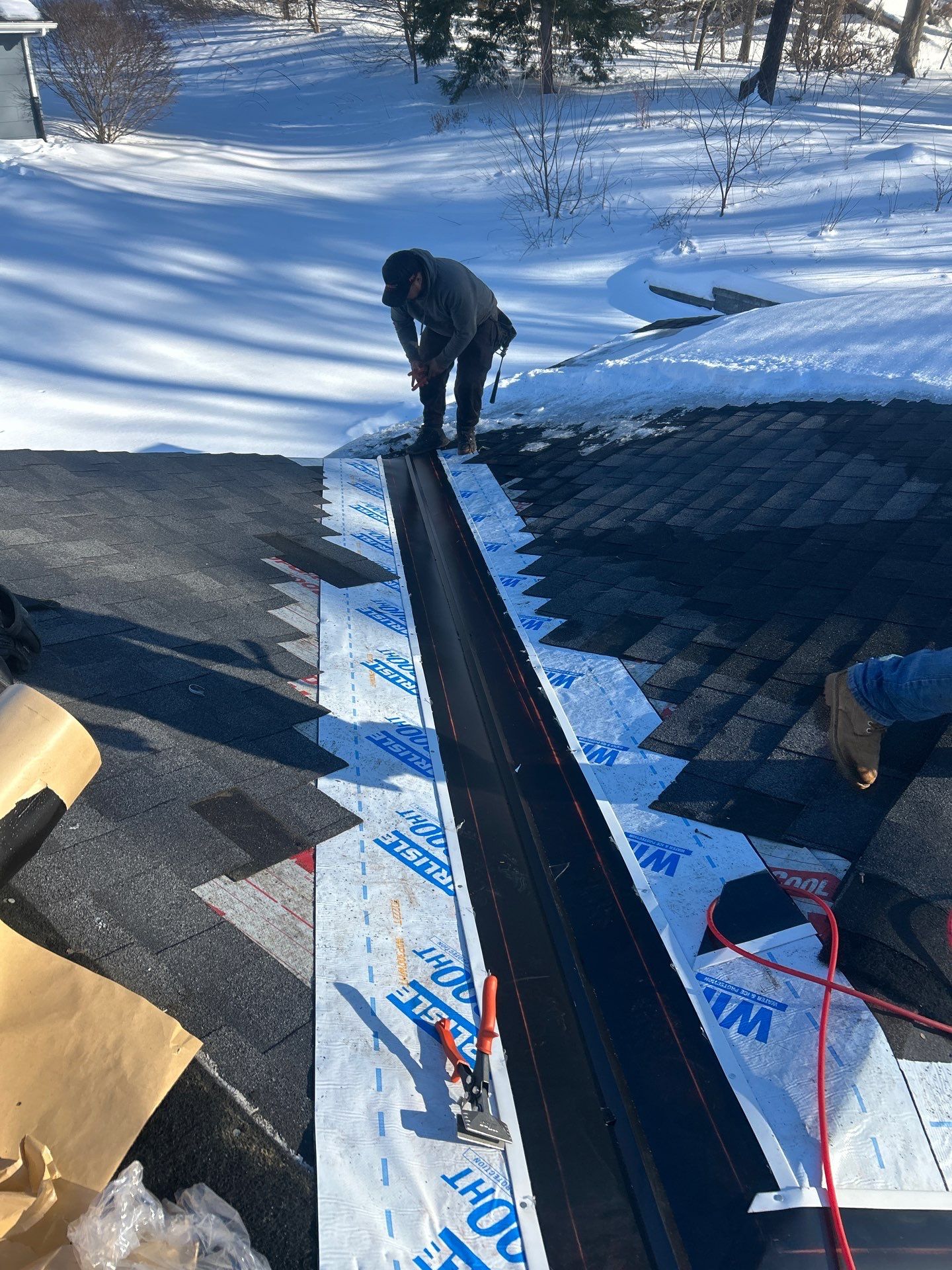 Ridge Cap Replacement & Black Metal Valley Installation in Chelmsford, MA by Mighty Dog Roofing of Greater Middlesex County