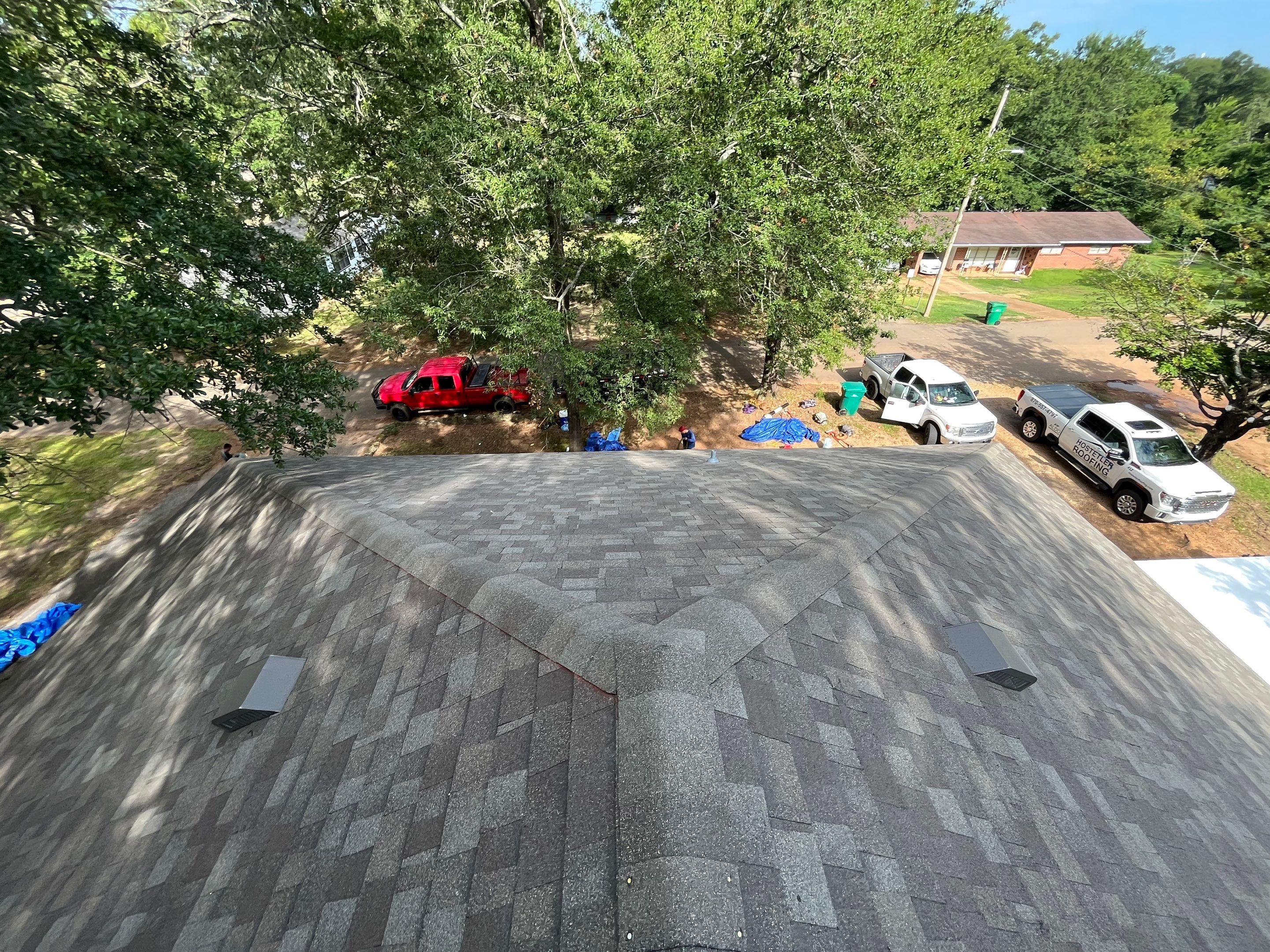 Storm Restoration Reroof: 30 Year Architectural Shingle by Hostetler Roofing