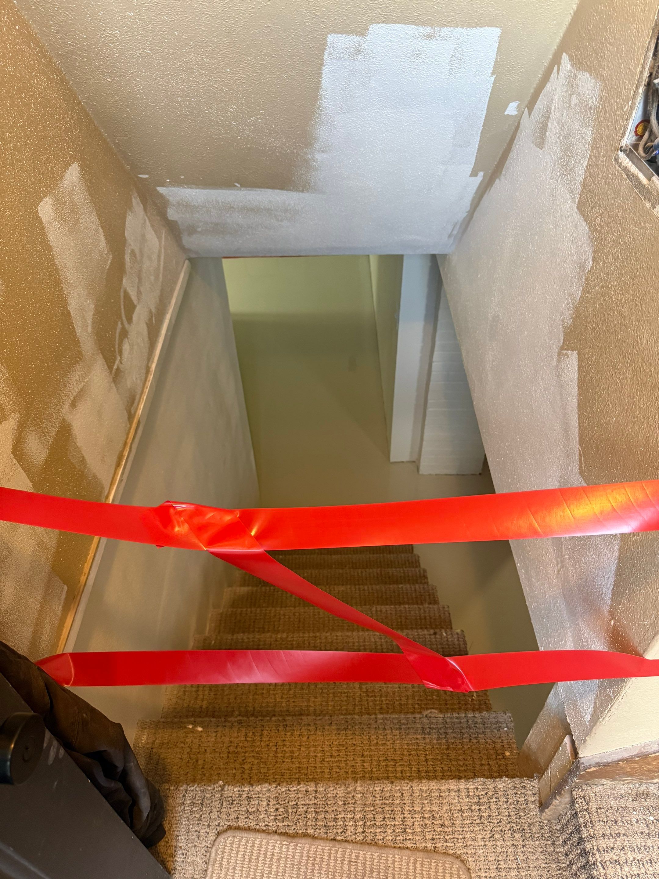 High-Gloss Epoxy Floor Coating and Basement Renovation in Rock Rapids by Select Painting, Coatings & Garage Cabinets