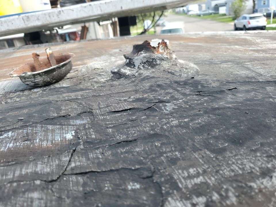 Residential Roofing Installation using 60 mil rubber roof  by Nitro Roofing and Construction