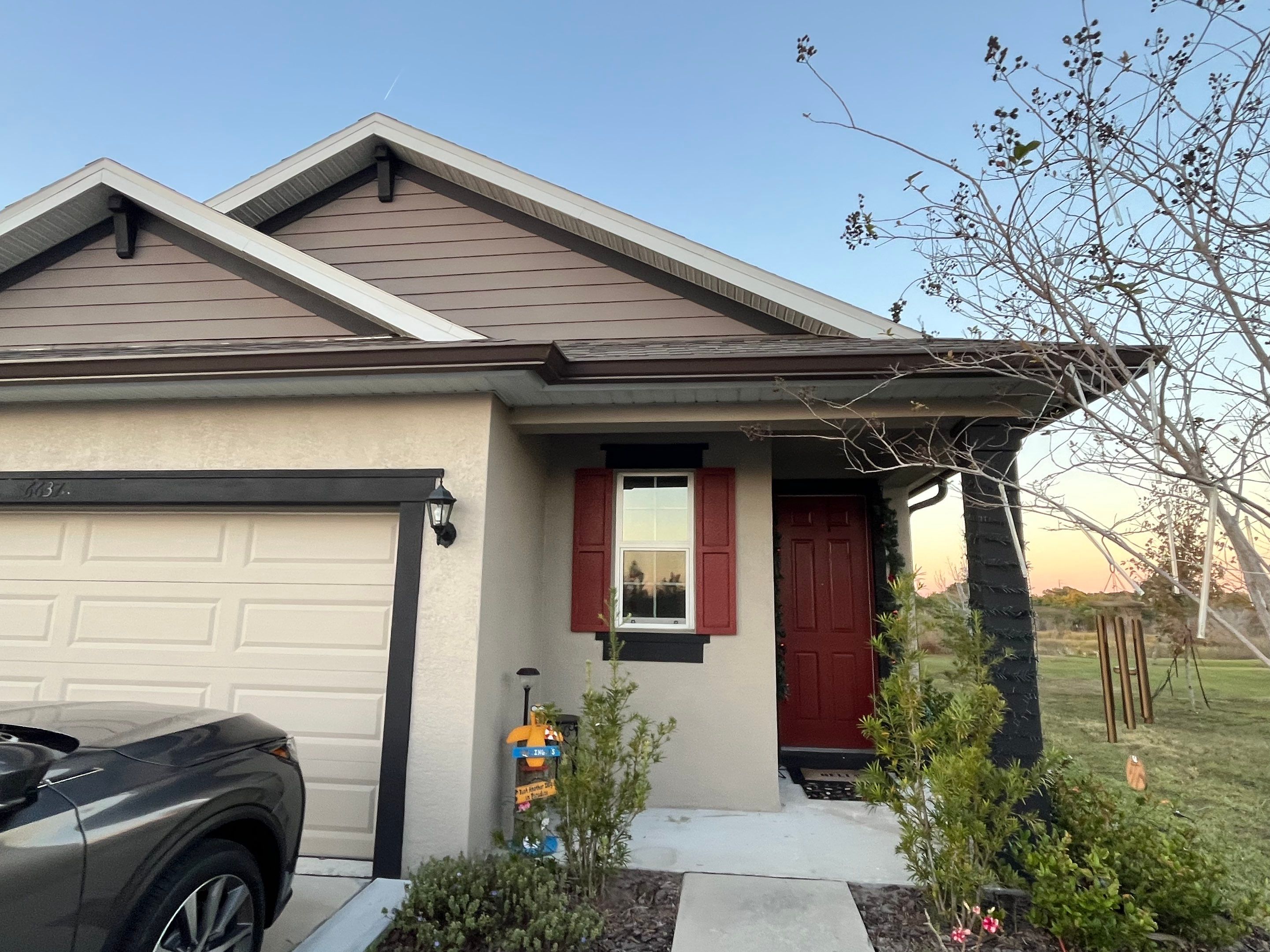 3X4 elbow Downspouts using Musket Brown Seamless Gutters in Lakeland FL by Gutter Professors
