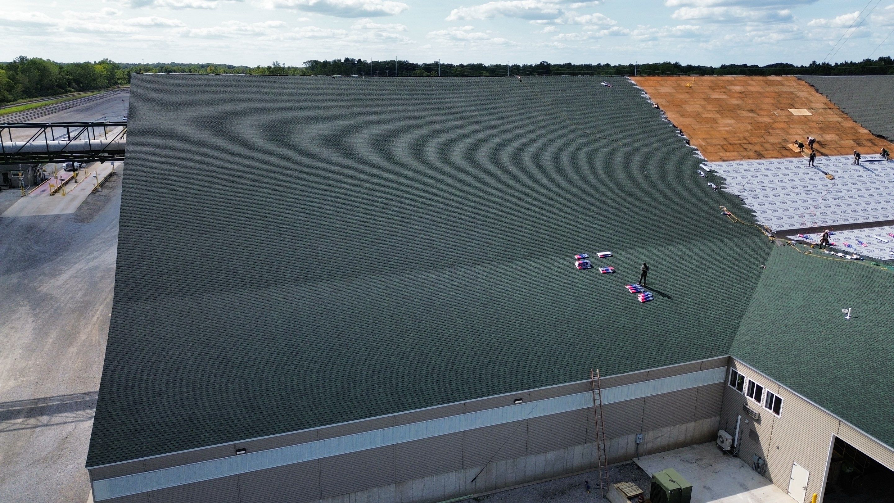 Commercial Roofing Installation using Timberline HDZ Shingles - Hunter Green by RoofX 