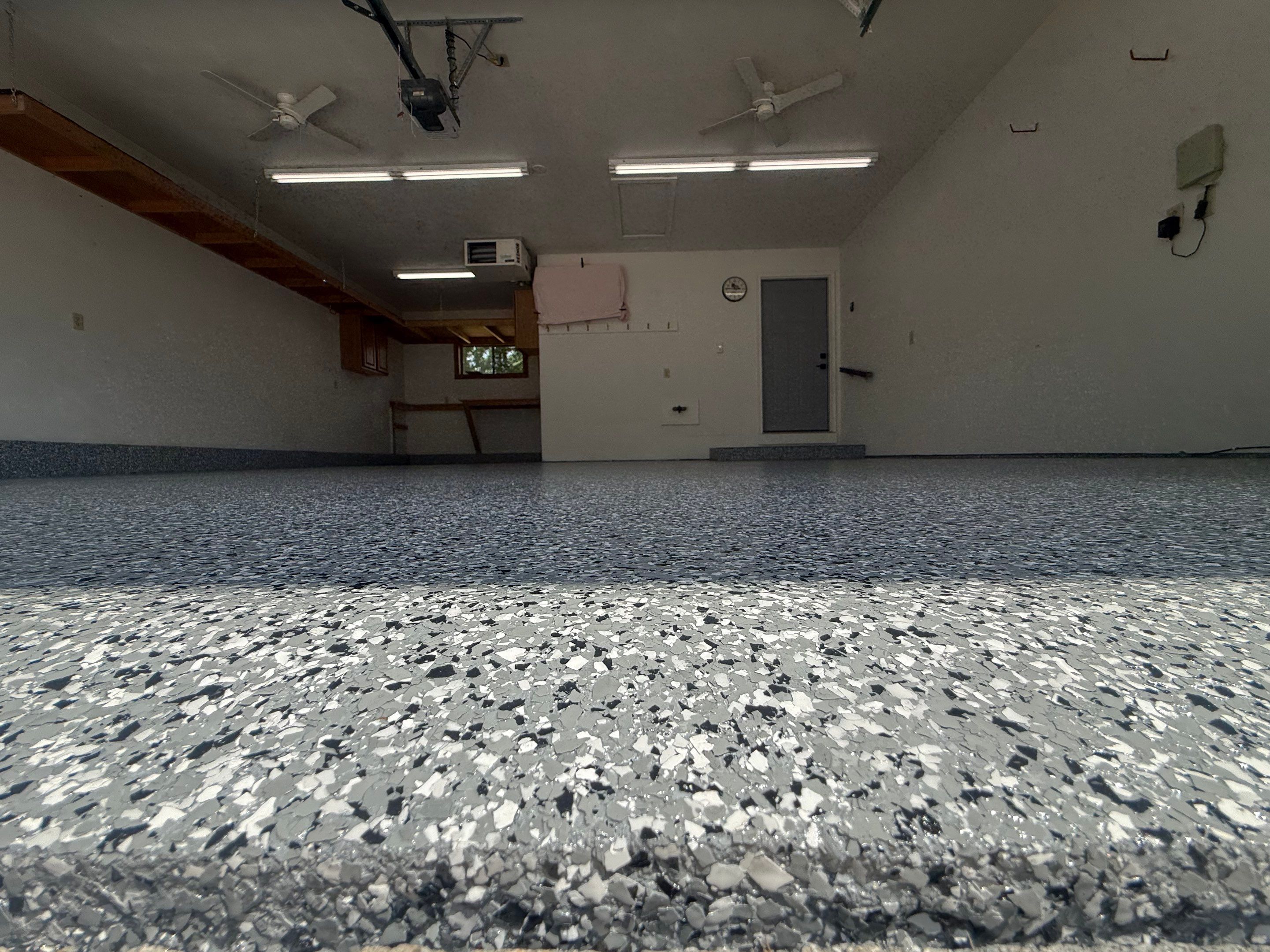 Smoke Flake Garage Floor Coating in Dell Rapids by Select Painting, Coatings & Garage Cabinets