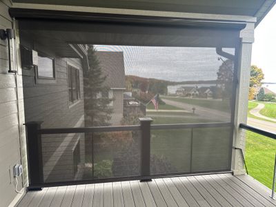 Retractable Sunesta Screen Installation for Covered Deck in Boyne City