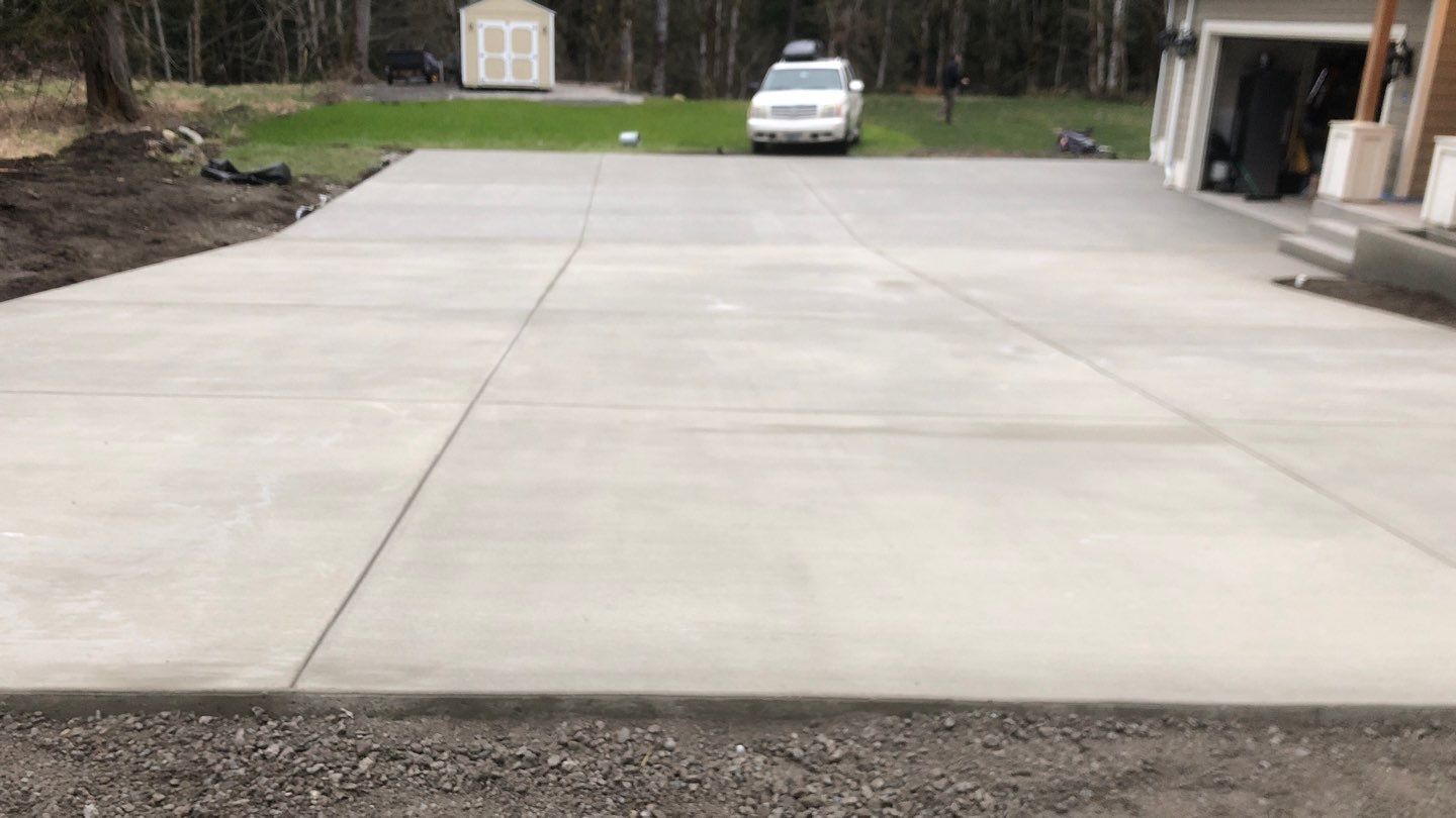 Mandy | Stamped Concrete Patio & Driveway by Jireh Asphalt & Concrete Inc 