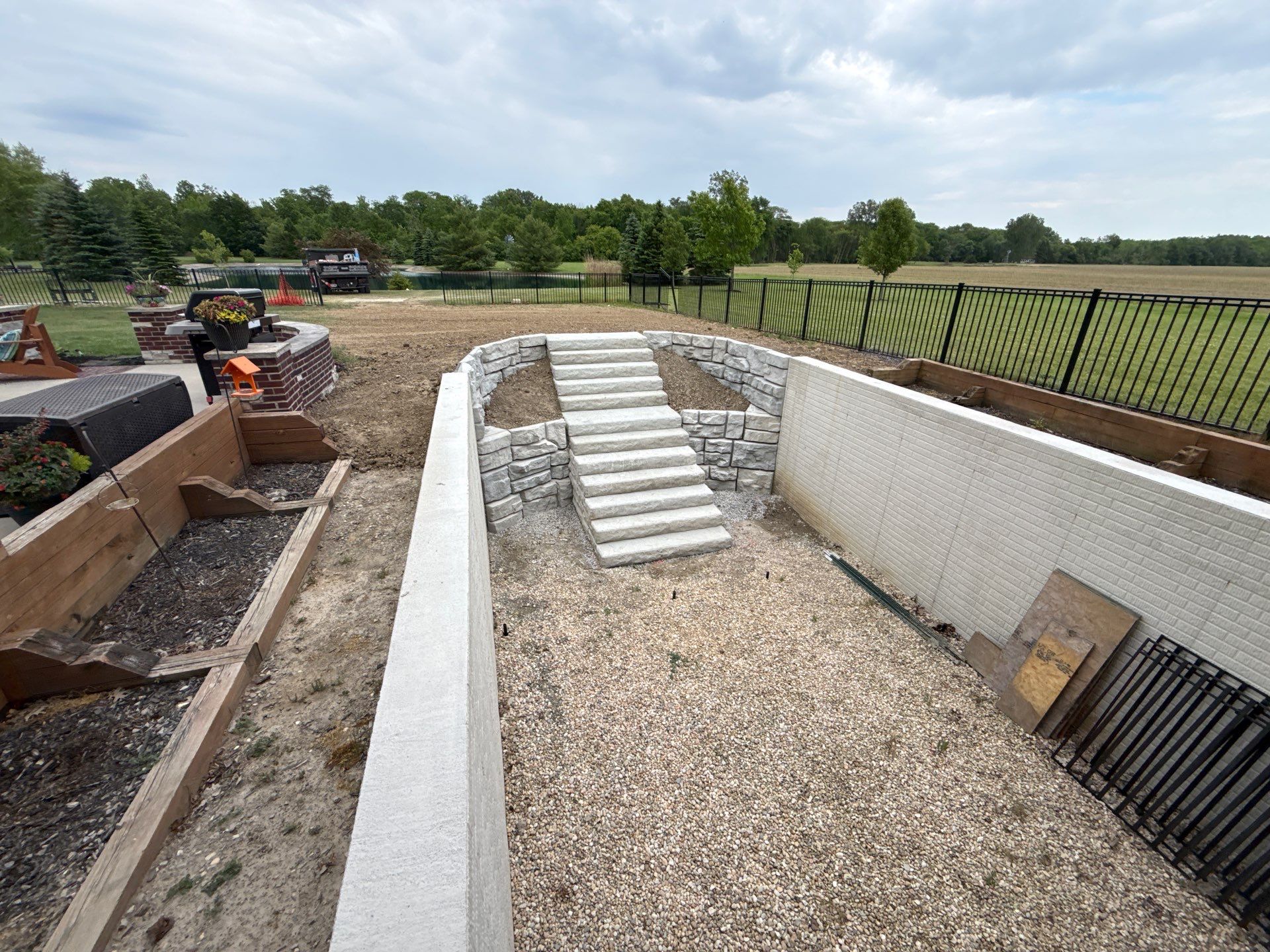 Basement Walkout Construction with Tiered Retaining Walls in Berkey by Farrell's Lawn & Garden Center LLC