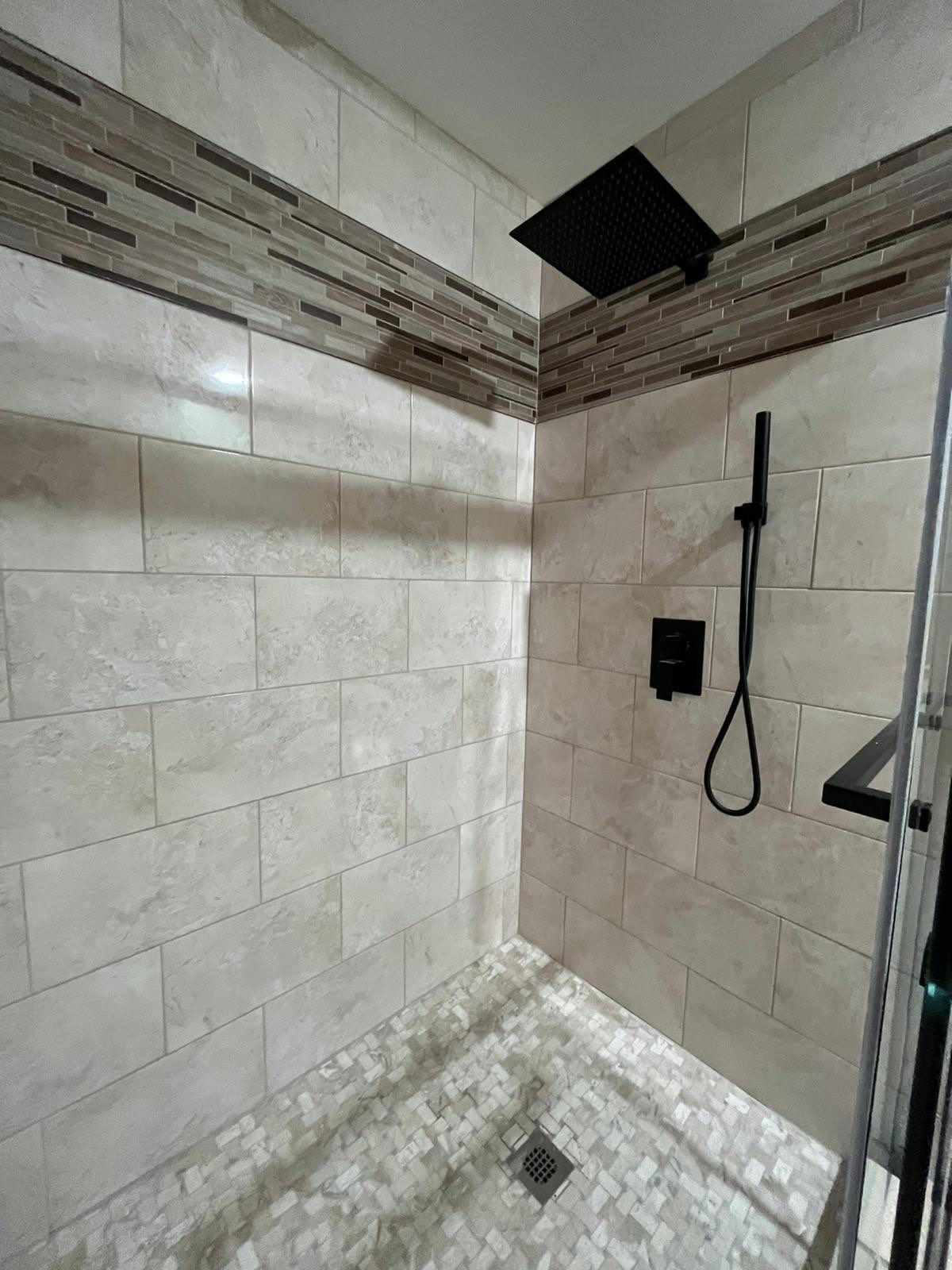 Bathroom Remodel using Tile by Home Concepts Construction