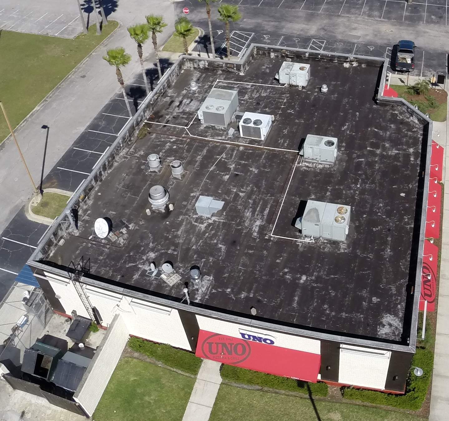 Uno's Pizza: Fiber Tite w/ Recovery board by Gold Key Roofing