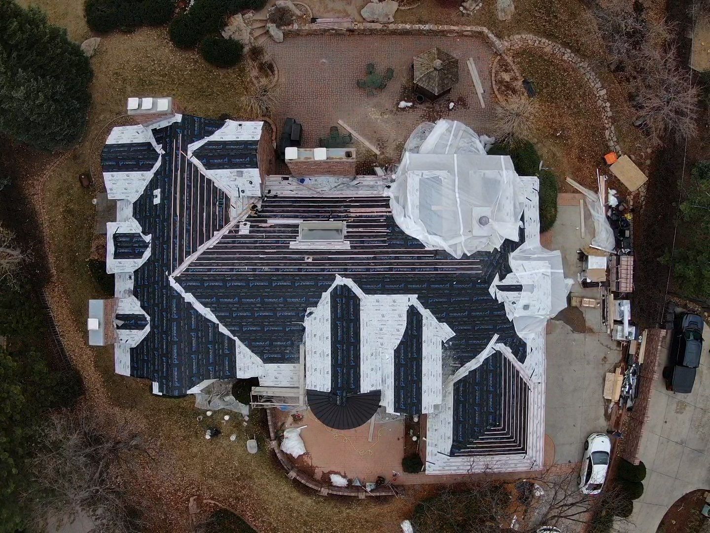 Unified Stone Coated Roof & Stucco Remodle by Blue Peaks Roofing LLC