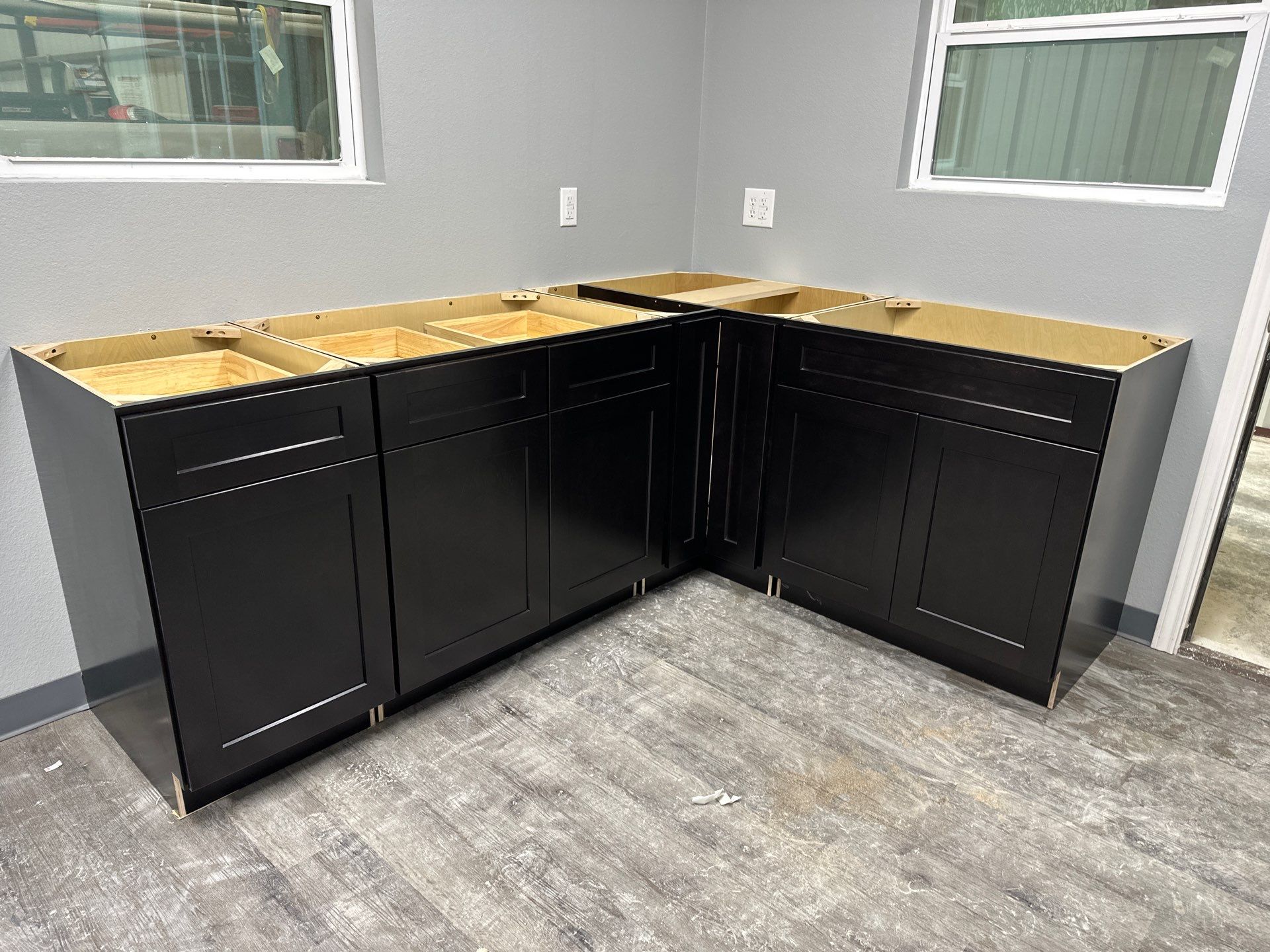 Commercial Efficiency: Warehouse Kitchen & Guest Area Cabinet Installation by Tibi Soli LLC