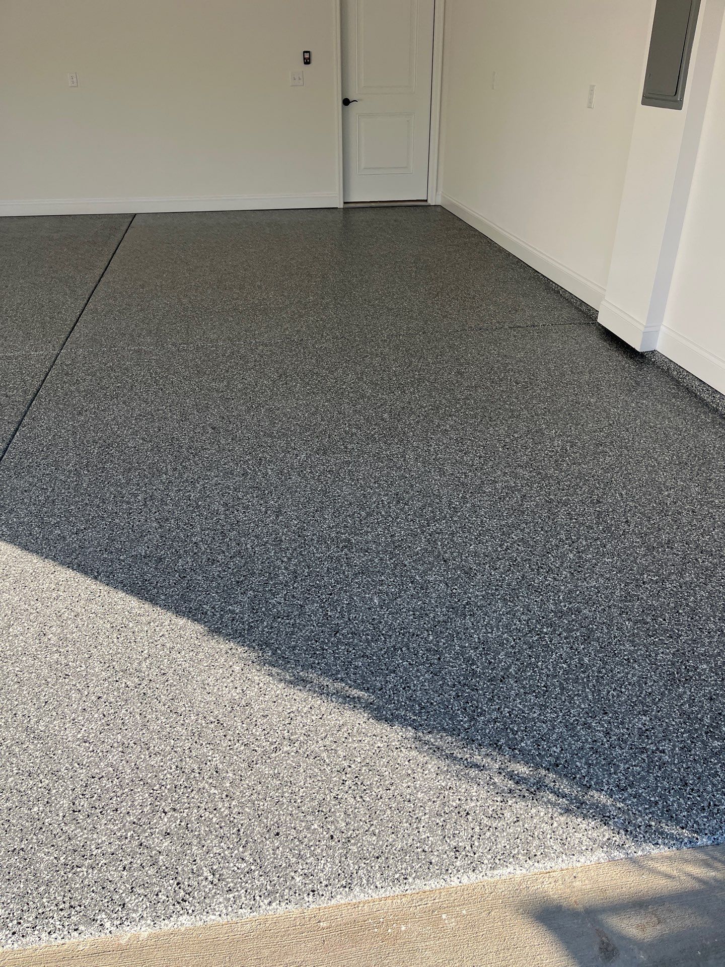 Garage Floor Coating using Wombat by My Garage Floor Guys