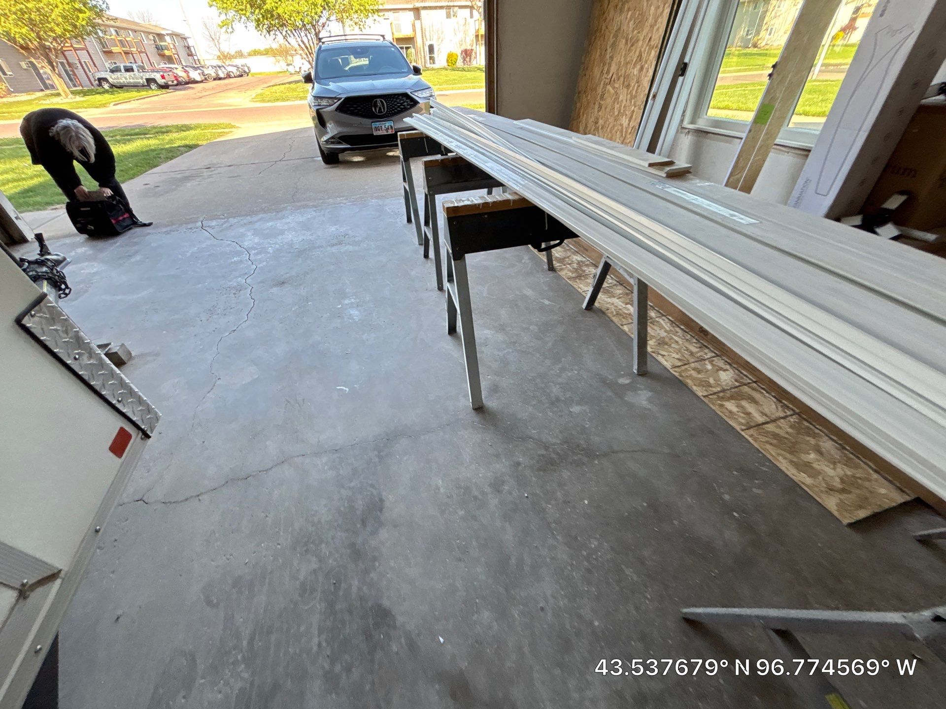 Coyote Flake Concrete Coating for Sioux Falls Garage by Select Painting, Coatings & Garage Cabinets