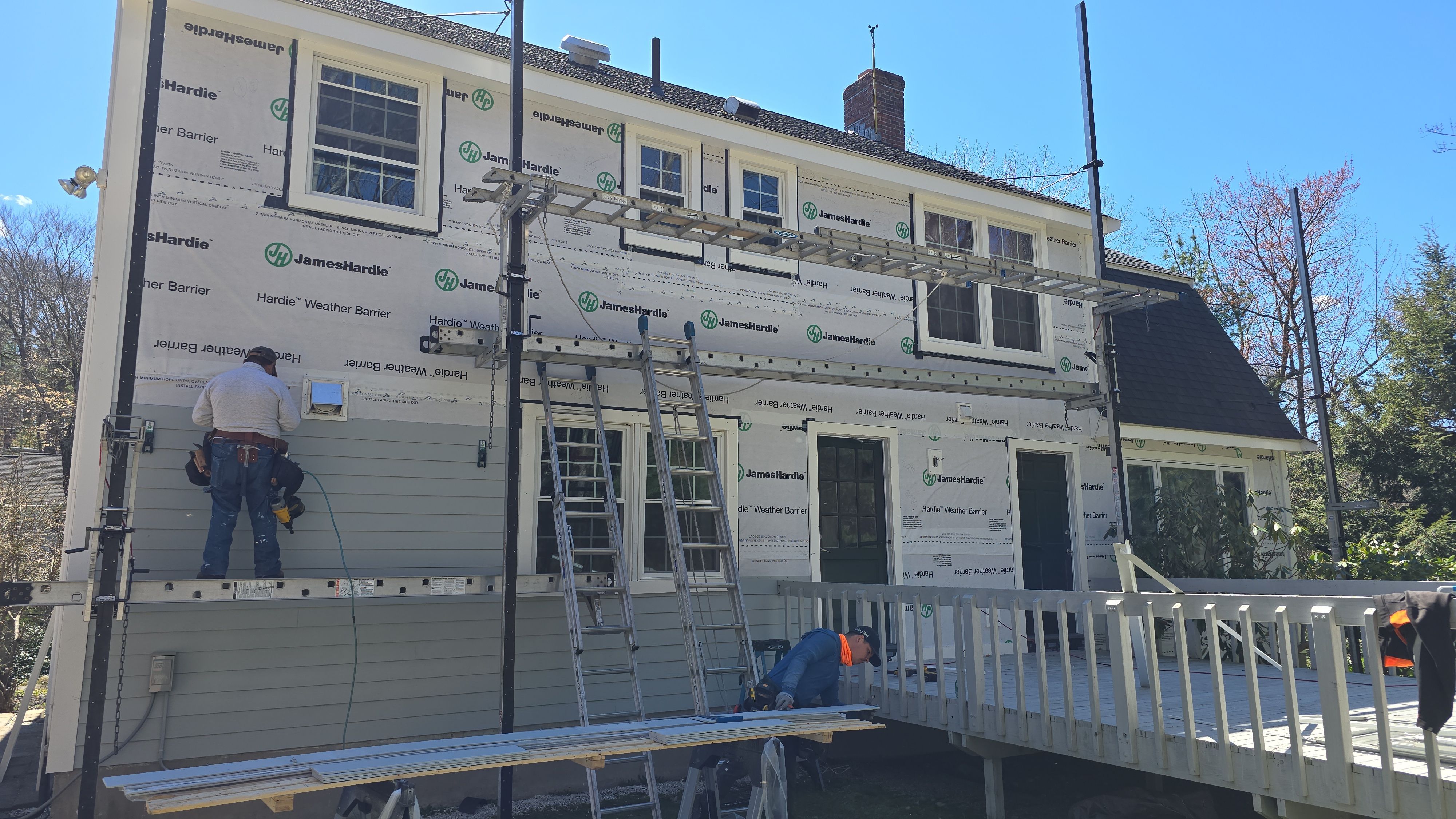 Custom window trim work and siding replacement in Dover, MA by UBrothers Construction