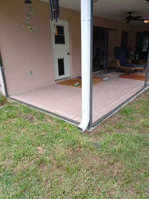 Replace gutter using White Down Spouts in Cape Coral FL