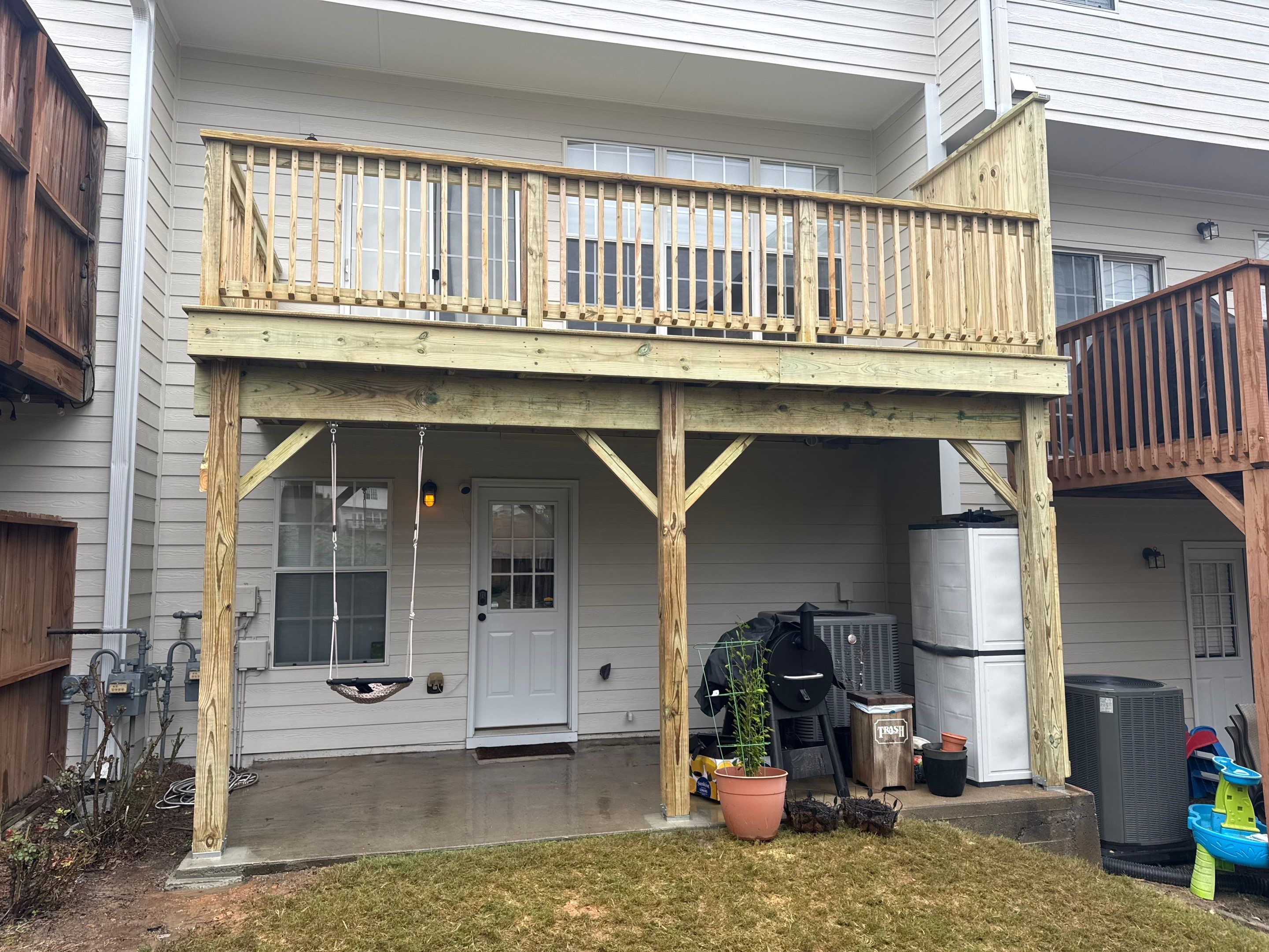 New Second-Story Pressure-Treated Wood Deck Installation in Atlanta by Swift Home Renovations