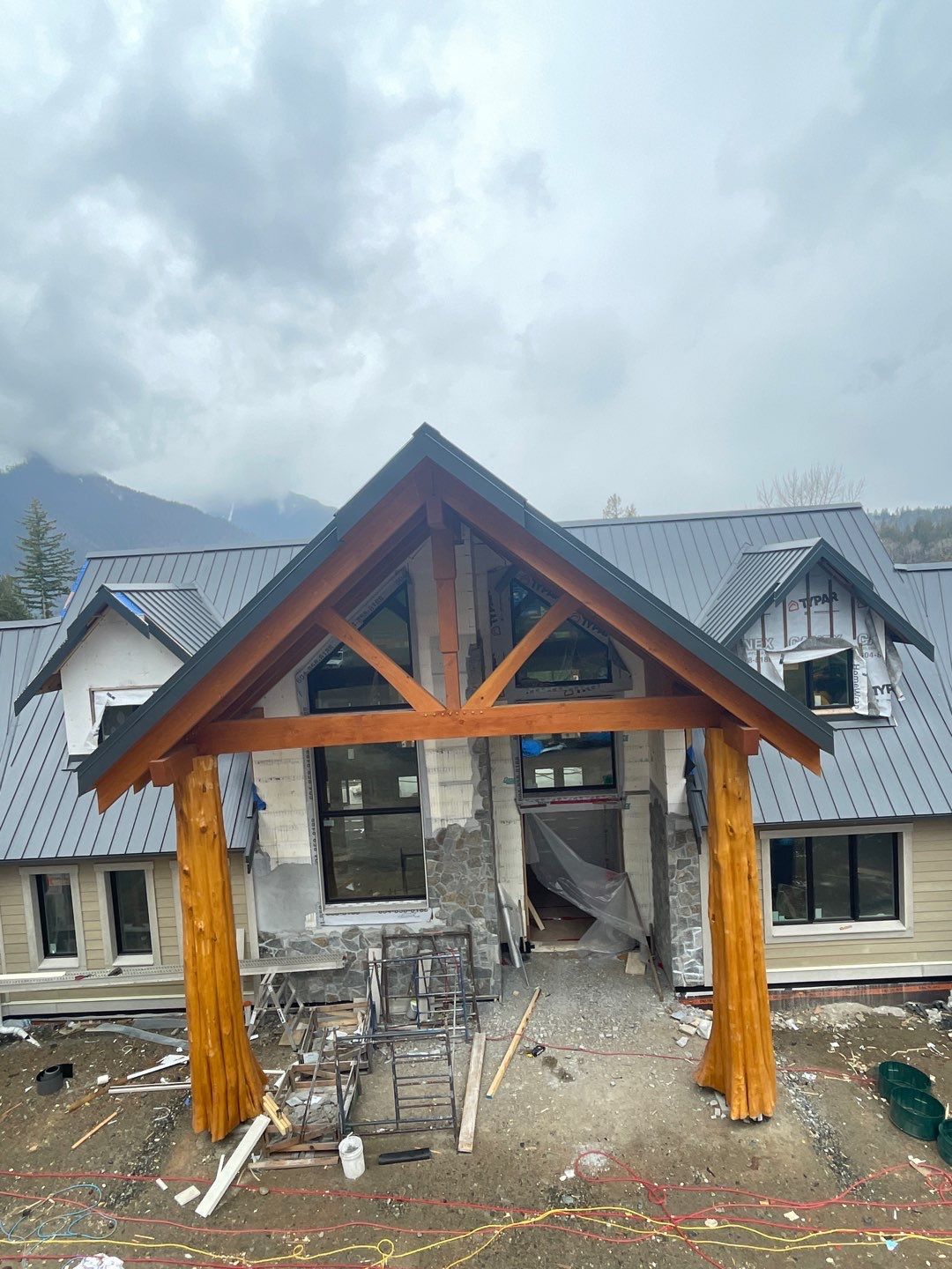 Residential Roofing Installation using 12" Prolok metal by Top Notch Roofing Inc