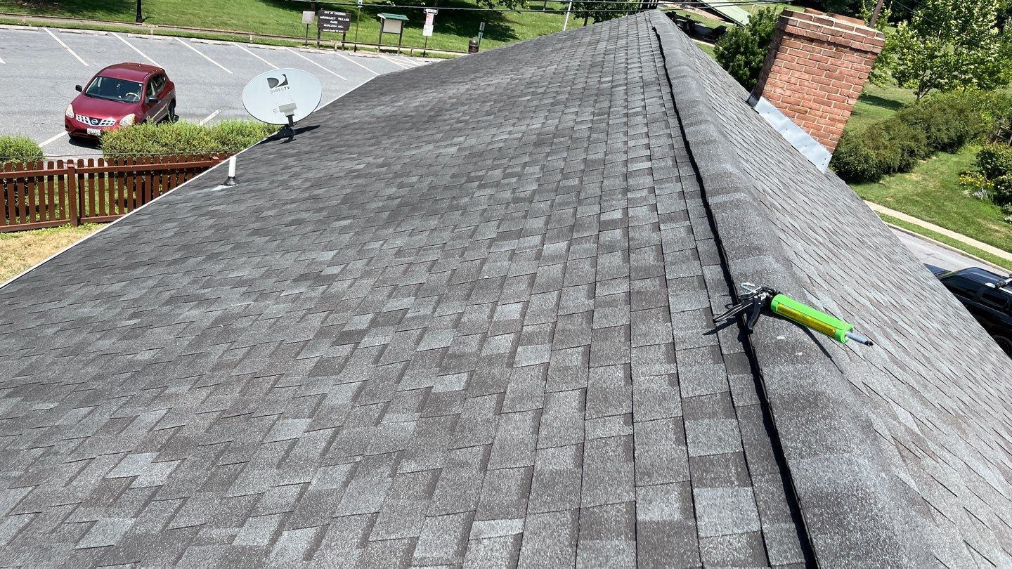 Residential Roofing Installation using Atlas Pinnacle Pristine Black Architectural Shingles by Frederick Roof Repair