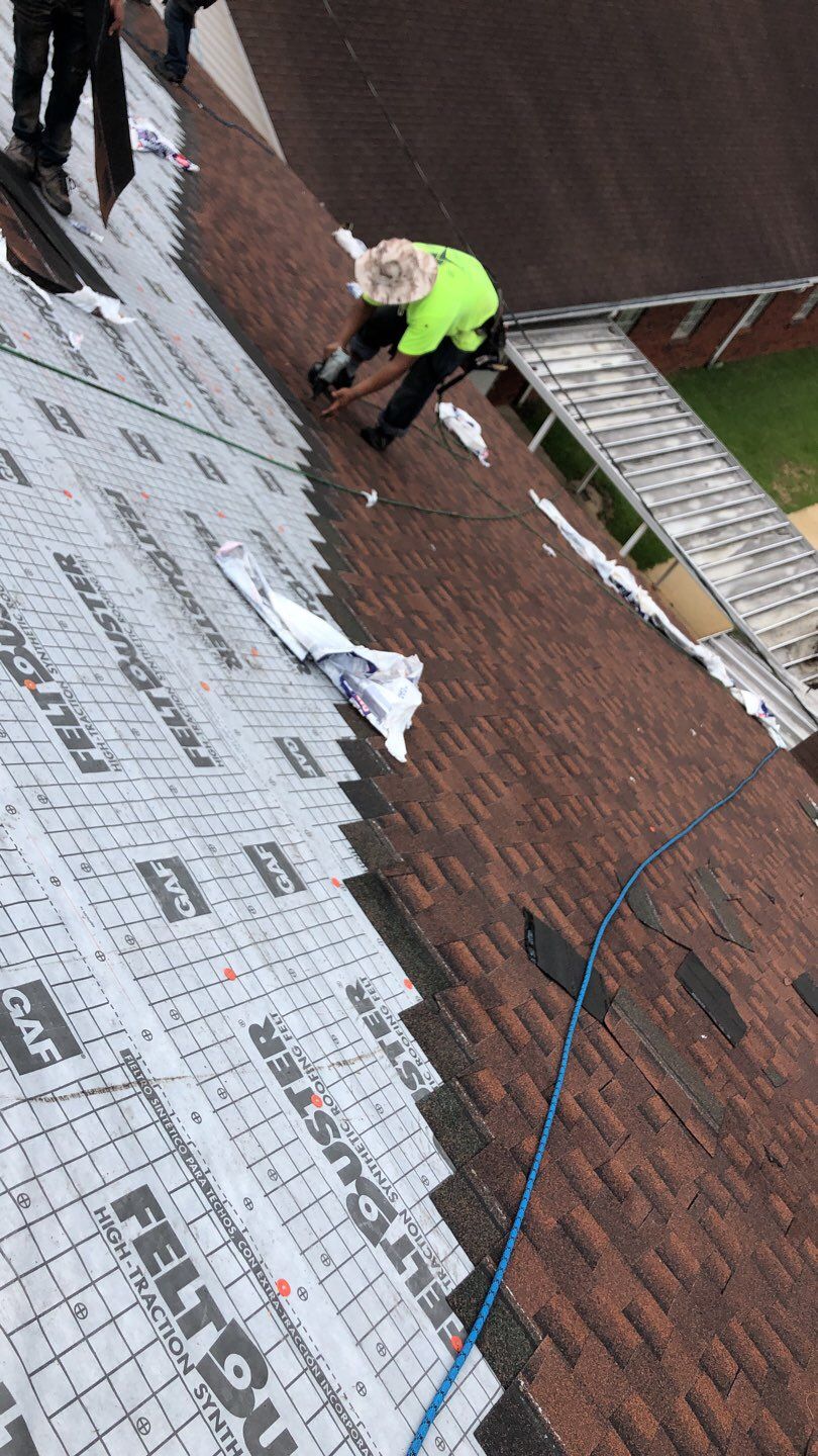 Residential Roofing Installation using Roof Replacement by American Roofing & Construction LLC