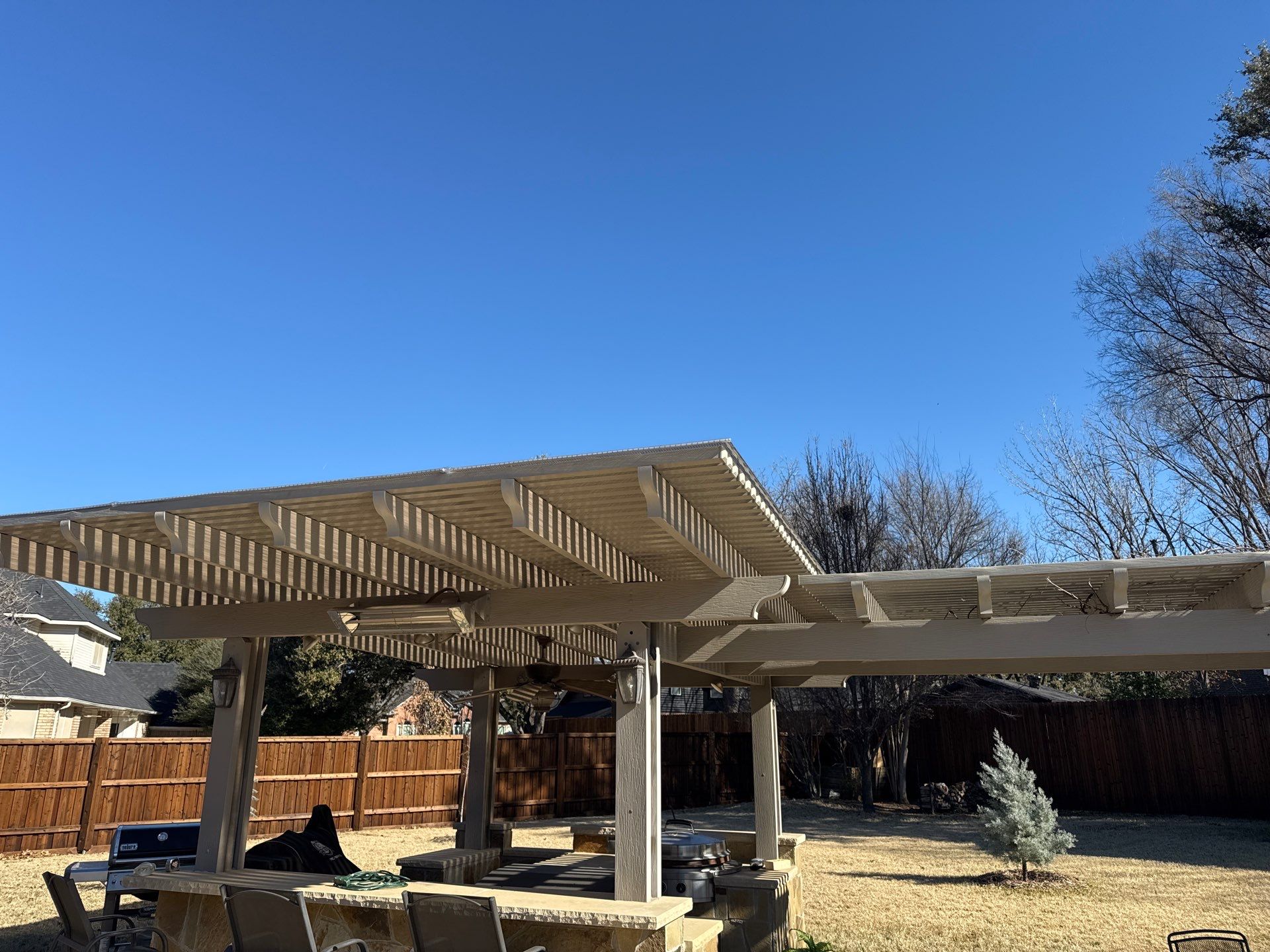 Polygal twin wall roofing system using 8mm bronze twin wall polygal by Grizzly Fence And Patio