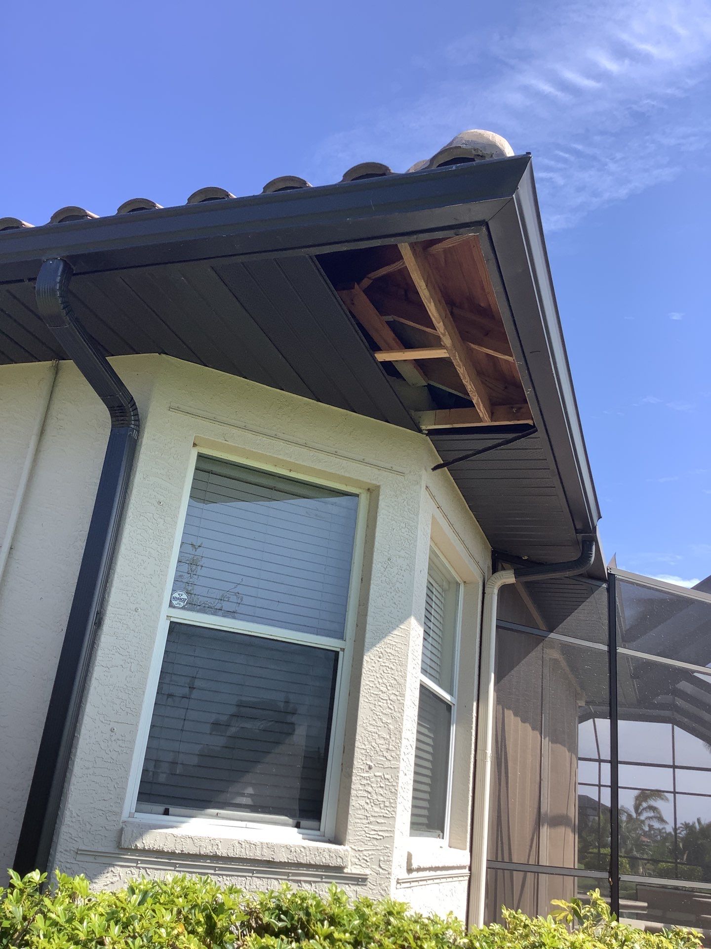 Dark Bronze Soffit Installation in Sarasota FL by Gutter Professors