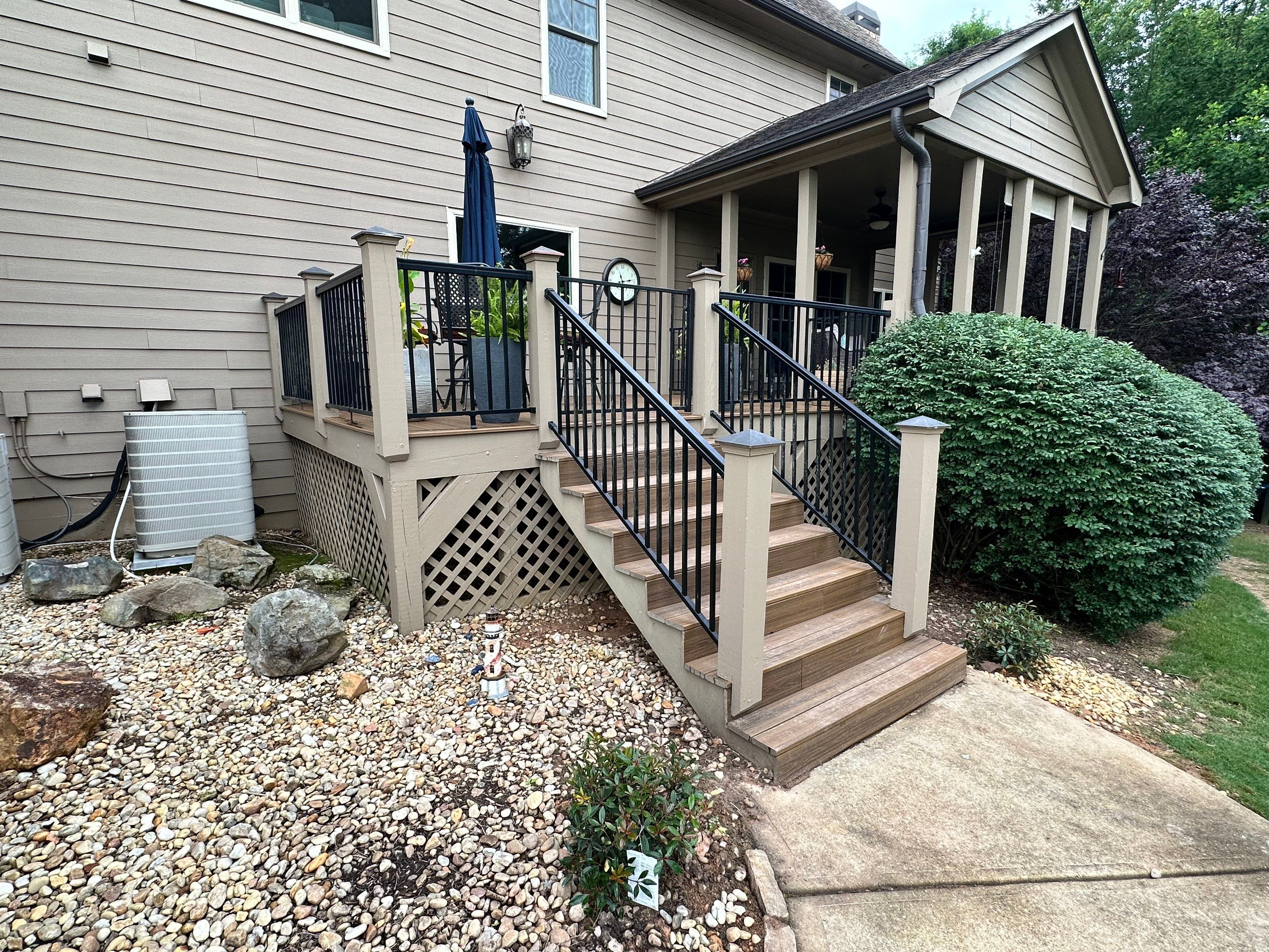 Composite Deck Flooring and Black Metal Railing Replacement in Dallas by Swift Home Renovations